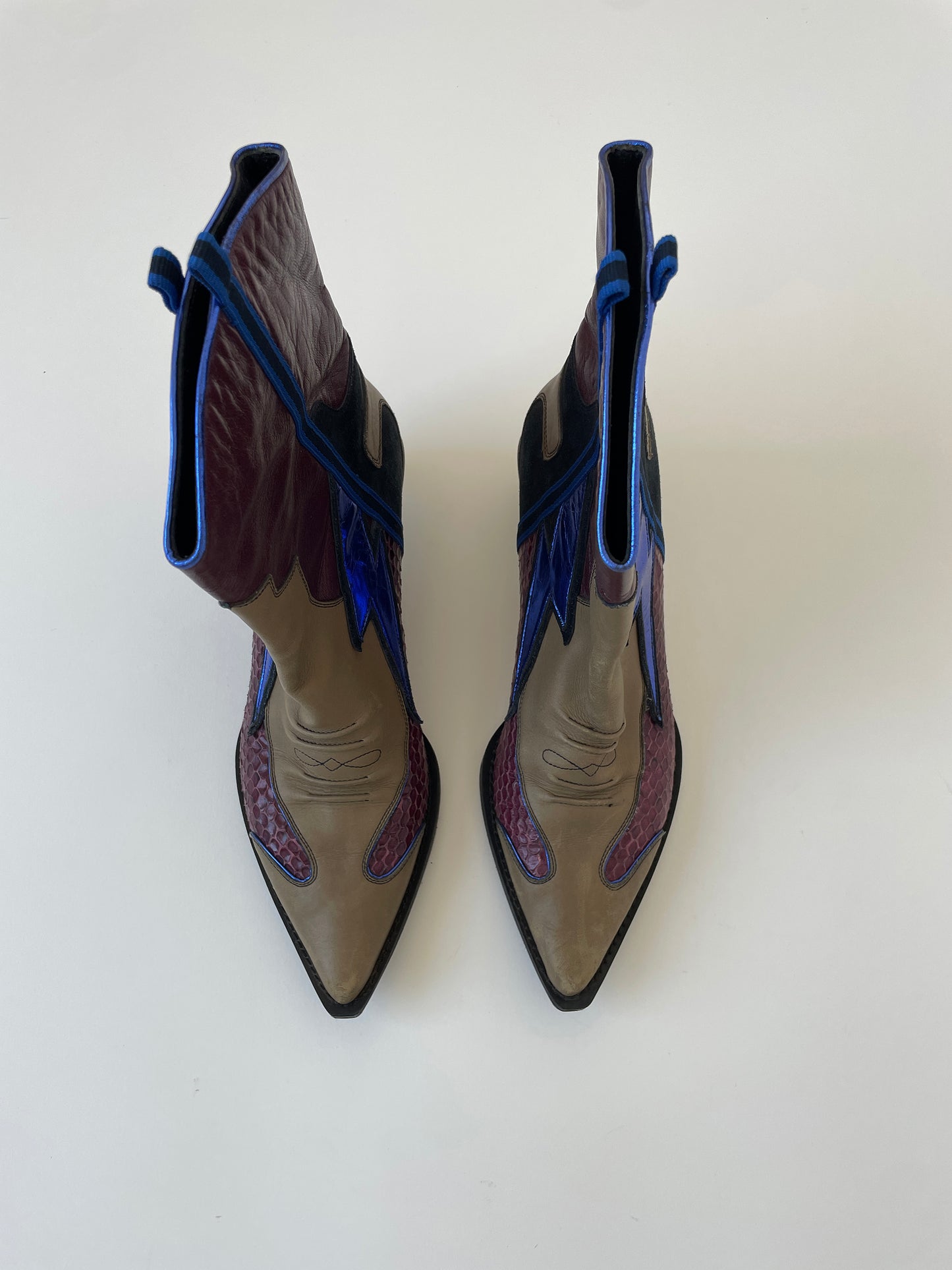 Vintage Miu Miu 1990s are python flash metallic kitten heel western boots.