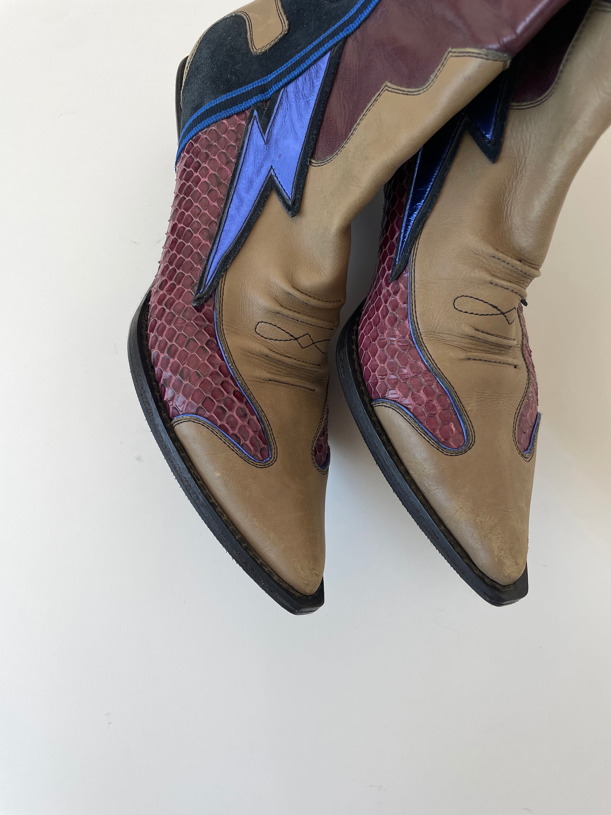 Vintage Miu Miu 1990s are python flash metallic kitten heel western boots.