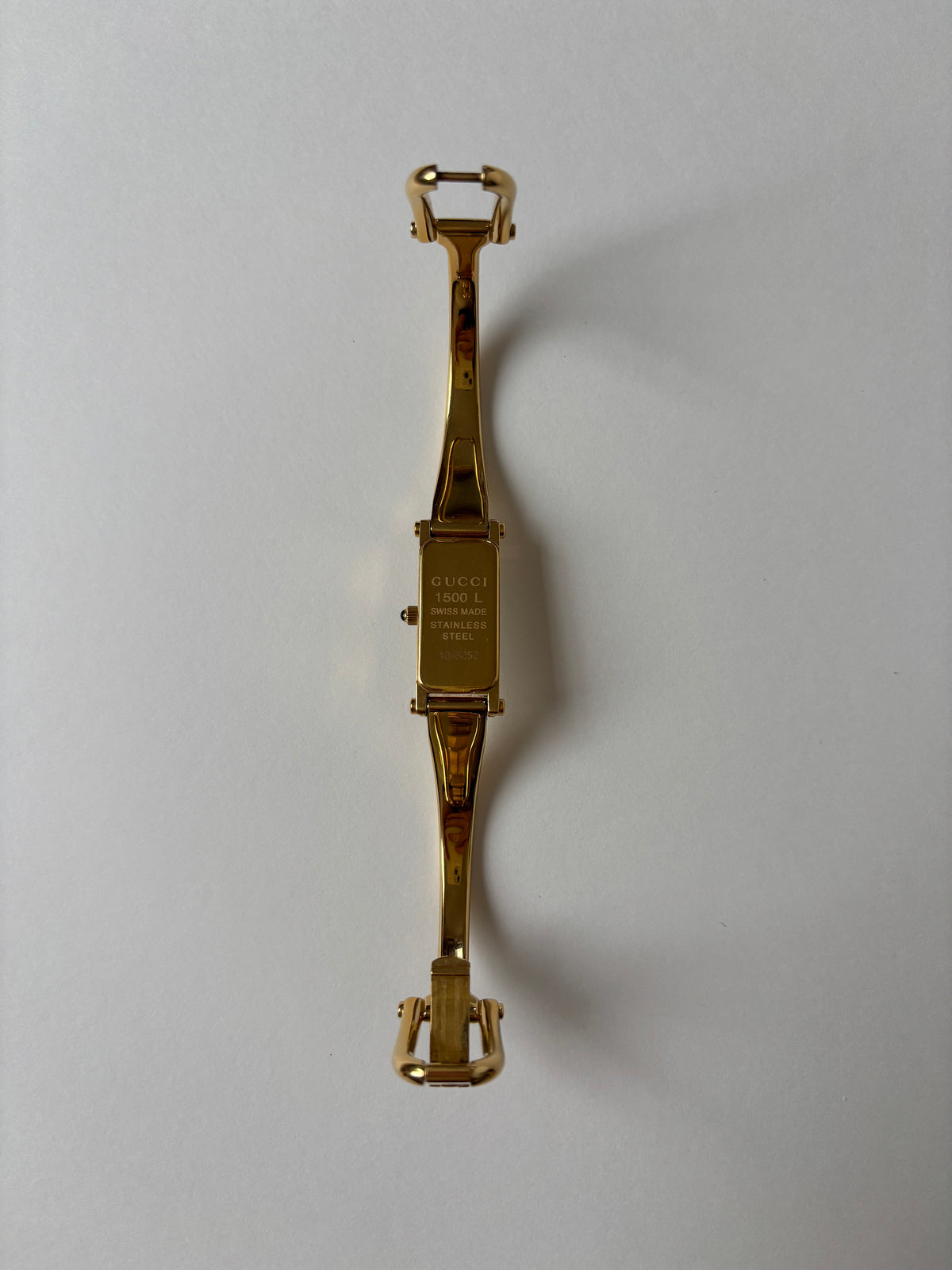 Gucci by Tom Ford 1990s 1500L 18K gold plated bangle watch