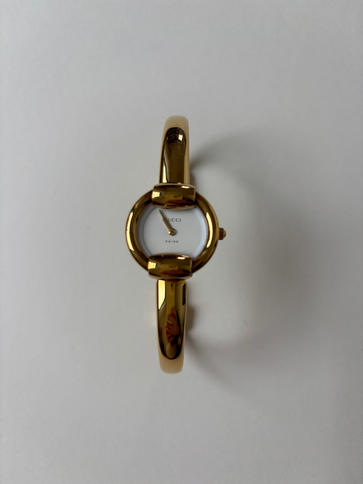 Gucci by Tom Ford 1990s 1400L 18K gold plated bangle watch