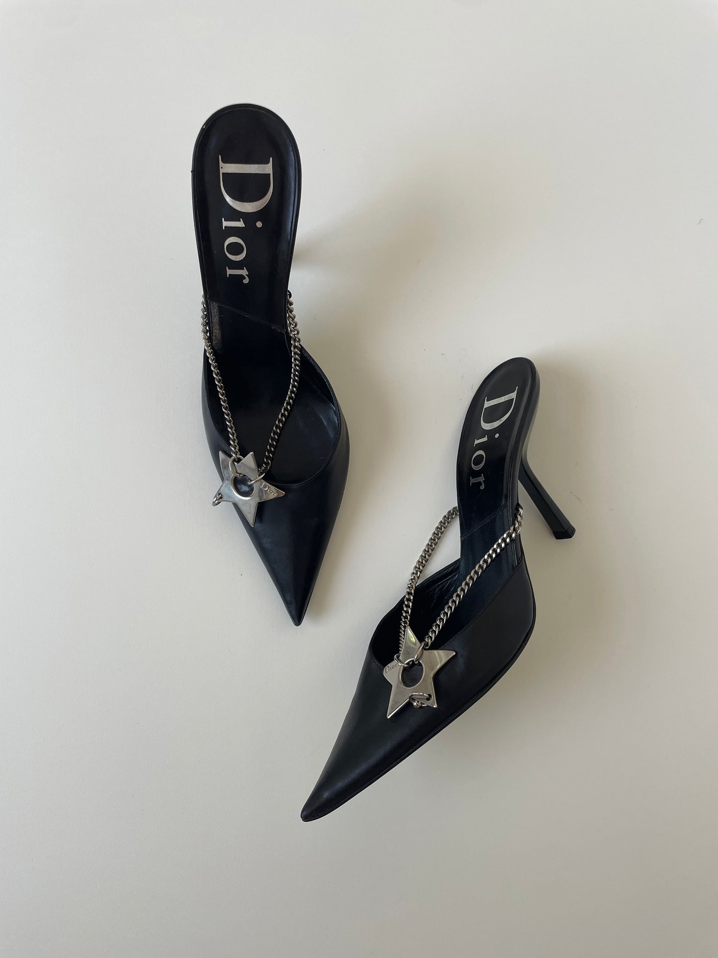 Vintage Christian Dior iconic S/S 2004 by John Galliano black hardcore mules with chains and pierced star application