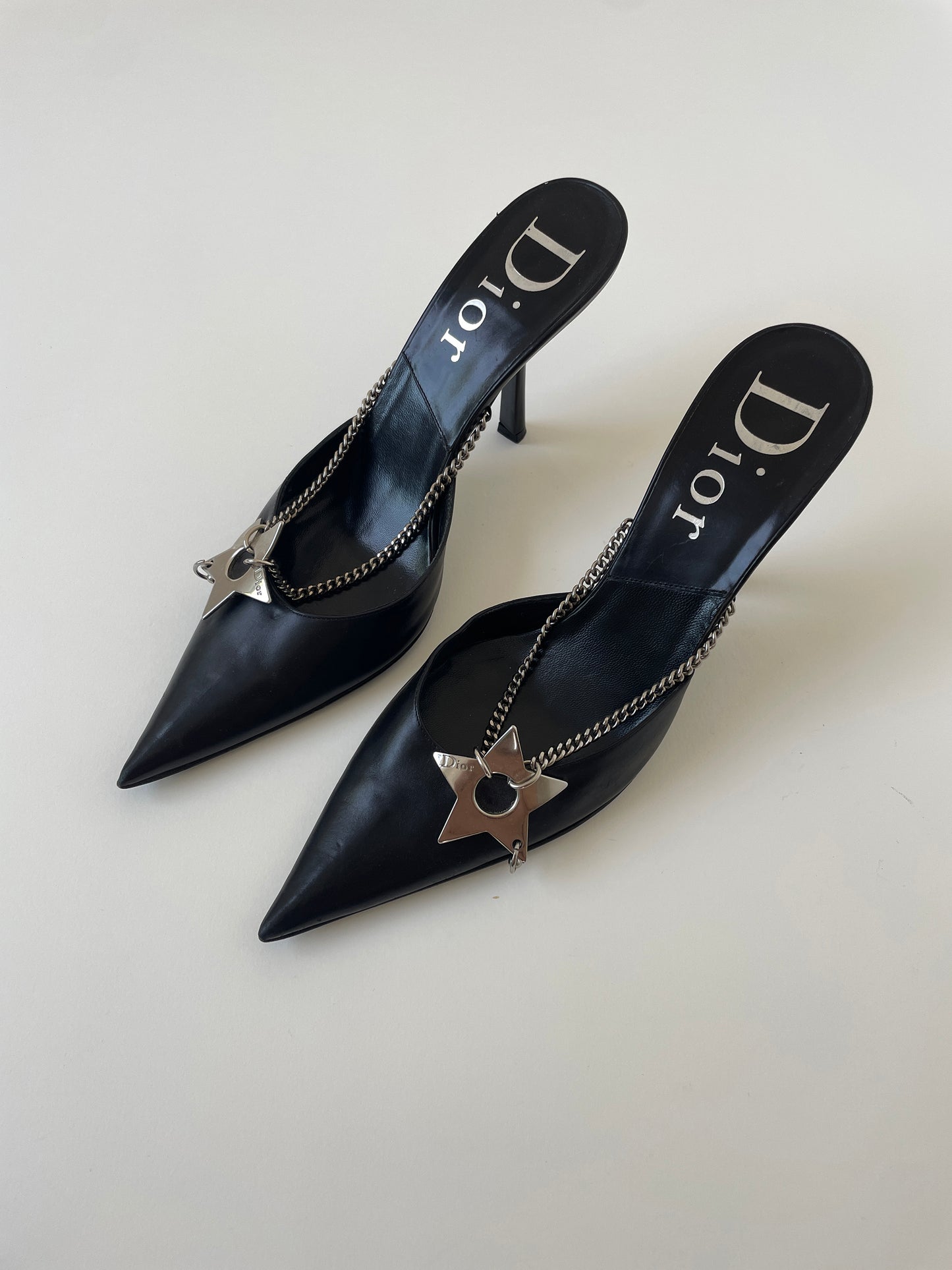 Vintage Christian Dior iconic S/S 2004 by John Galliano black hardcore mules with chains and pierced star application