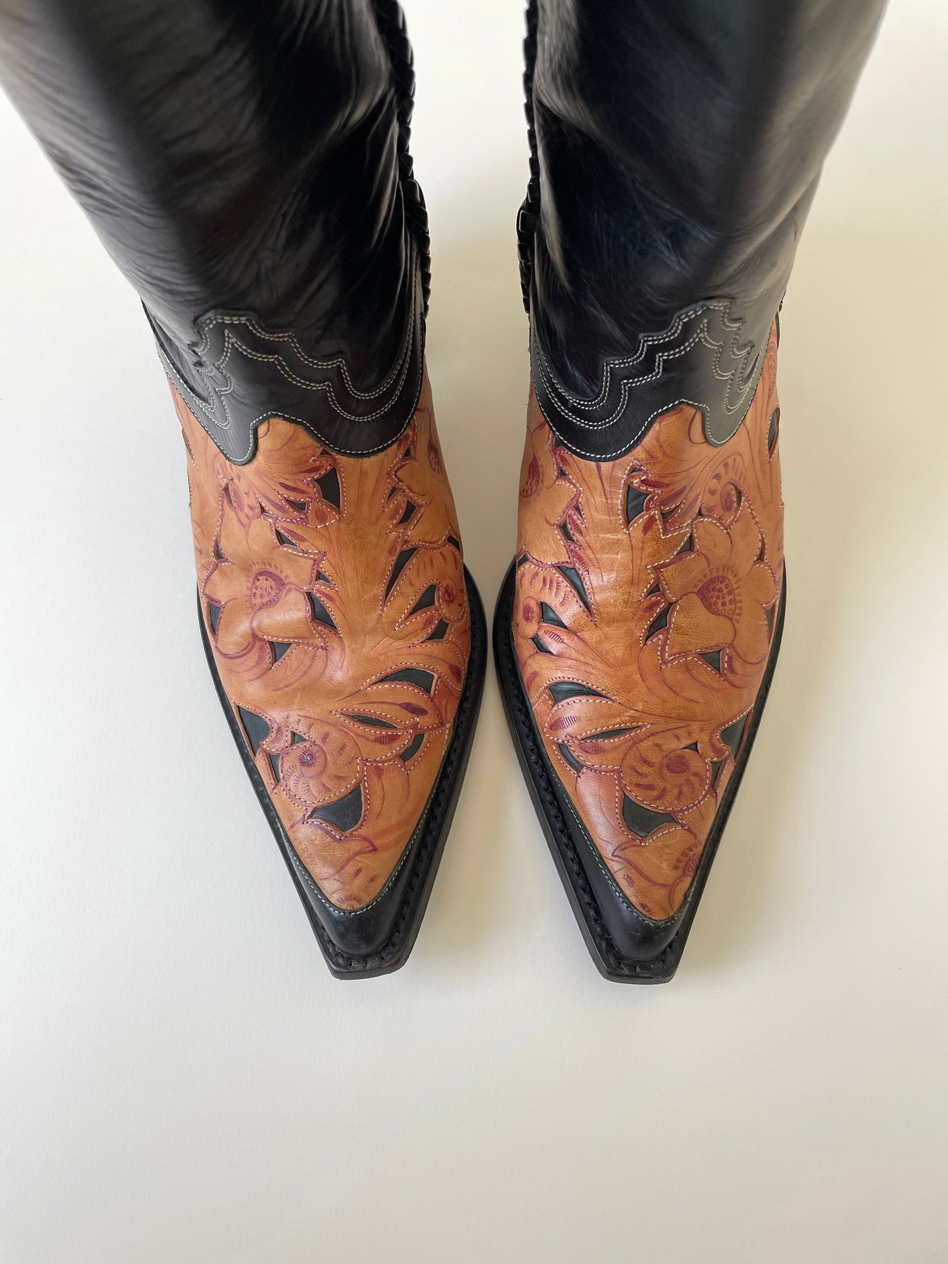 Vintage Blumarine SS 2002 iconic black hand painted western boots with floral cutout details.