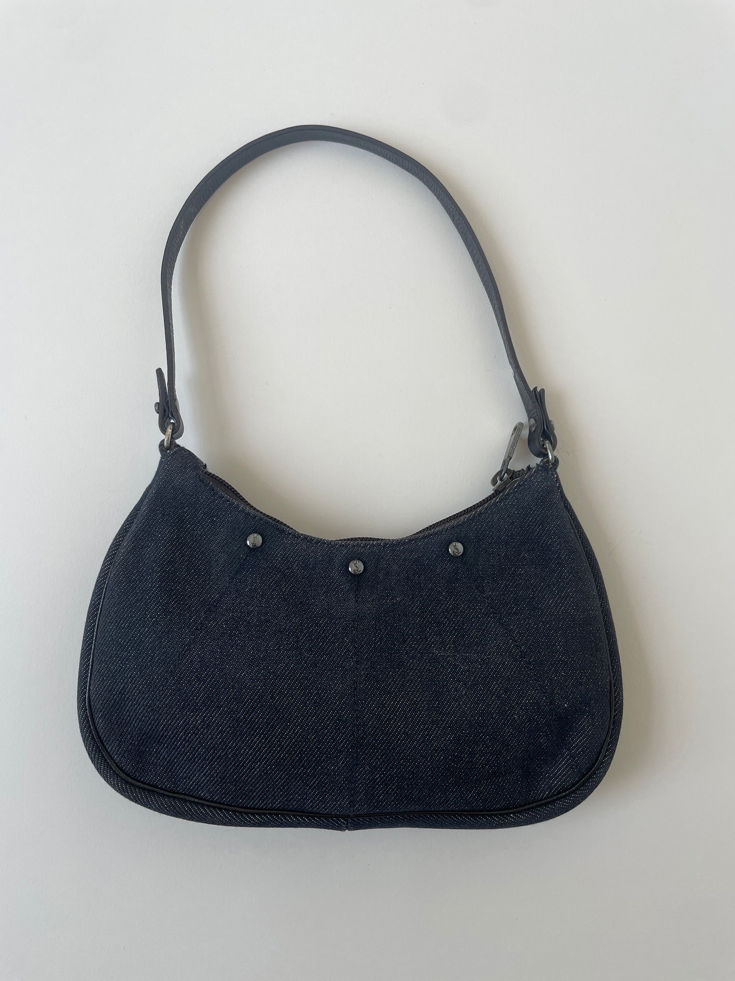Vintage YSL by Tom Ford 2000s denim mini mombasa baguette bag with logo studs and embossed logo at the strap