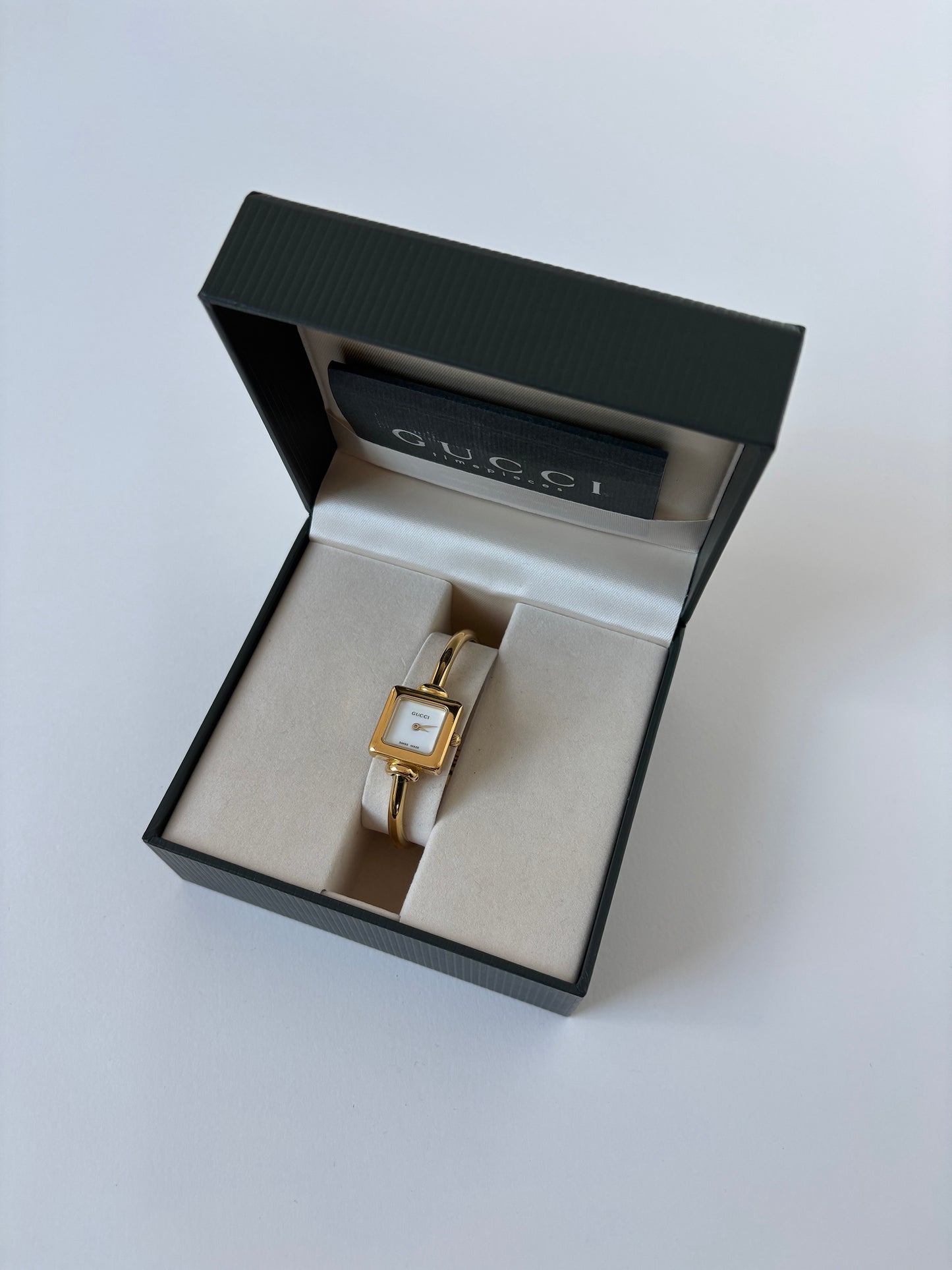 Gucci by Tom Ford 1990s 1900L 18K gold plated bangle square watch