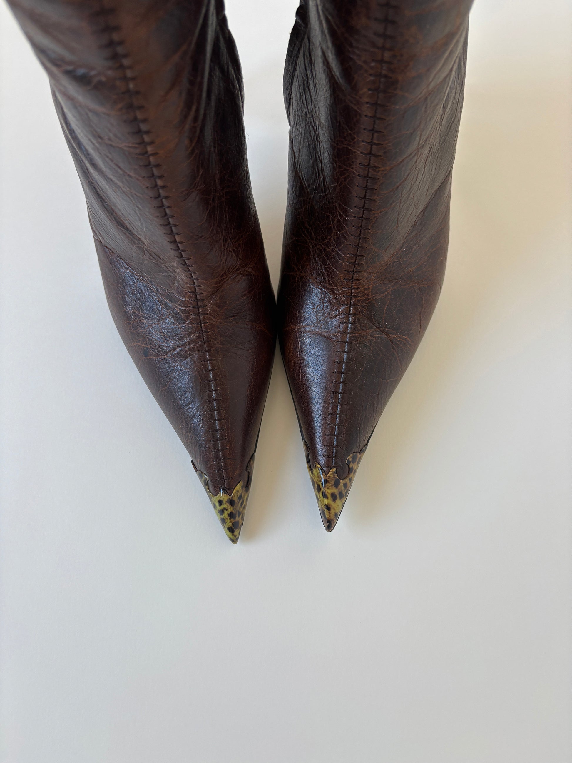 Vintage Roberto Cavalli F/W 2001 iconic distressed dark brown boots with leopard details.