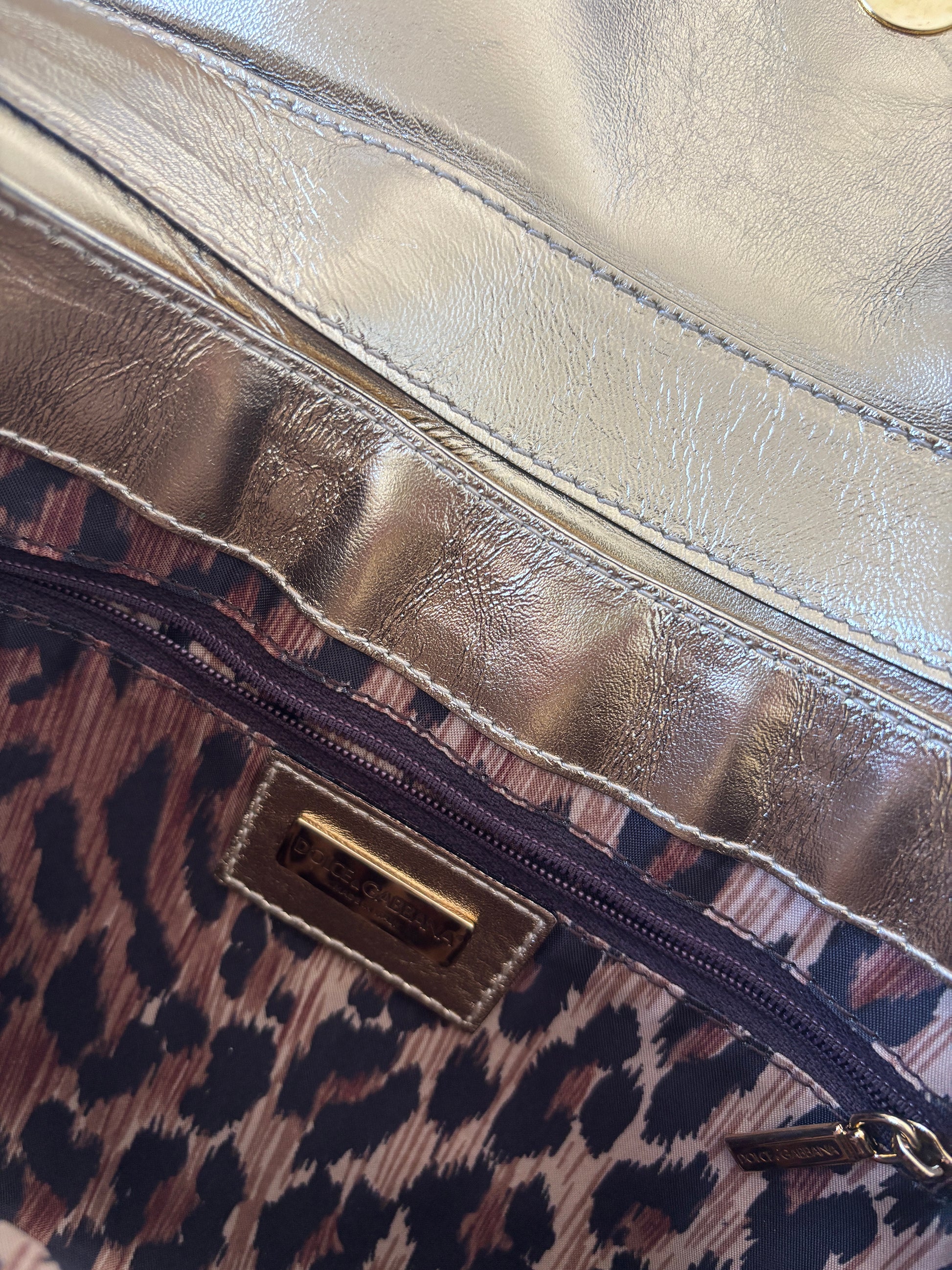 Vintage Dolce & Gabbana O-Ring SS 2005 XL baguette bag python leather and denim with chunky ring details. Iconic cheetah print lining.