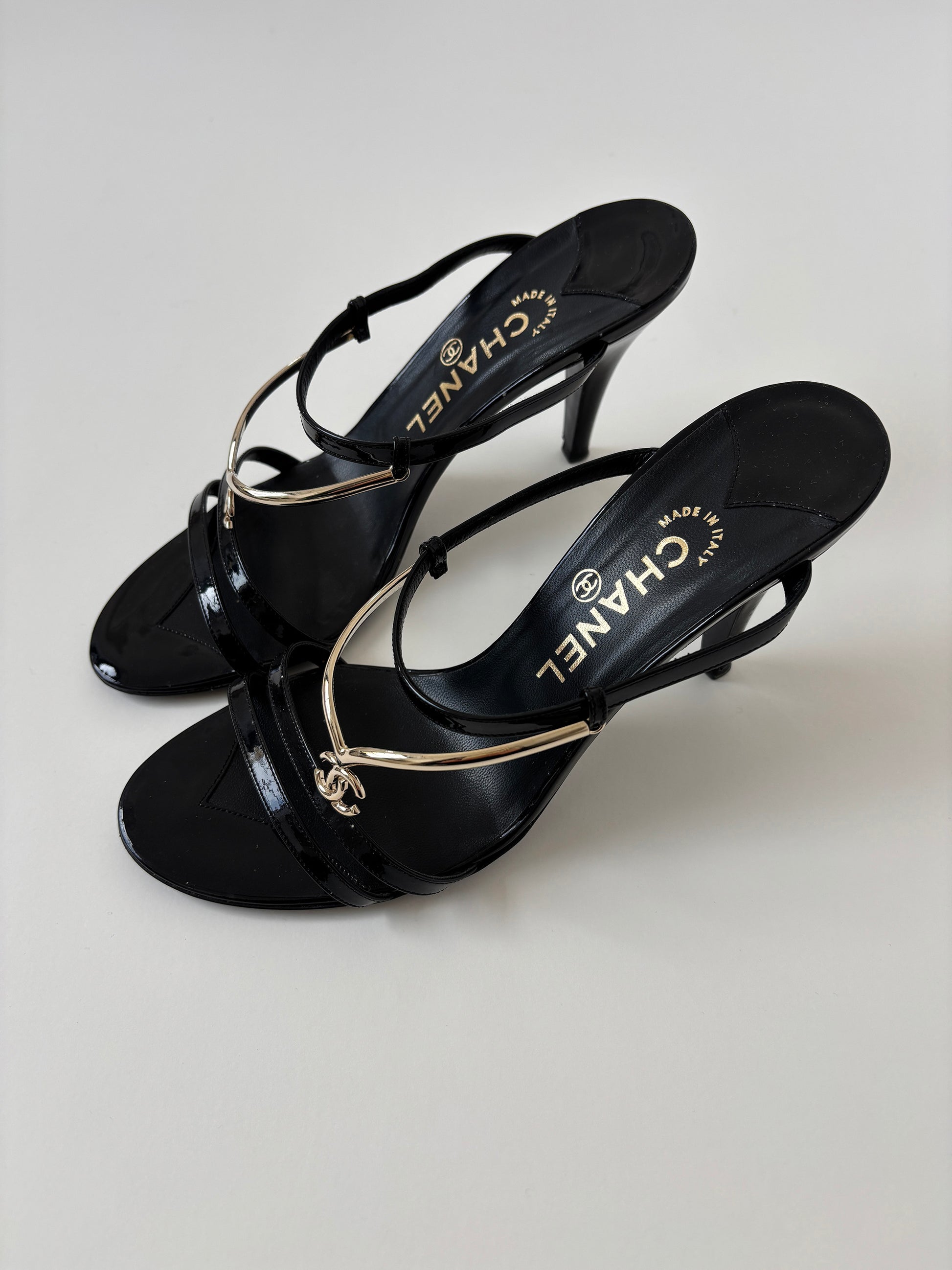 Vintage Chanel by Karl Lagerfeld 2000s black mules with golden CC logo tiara details. Very rare find.