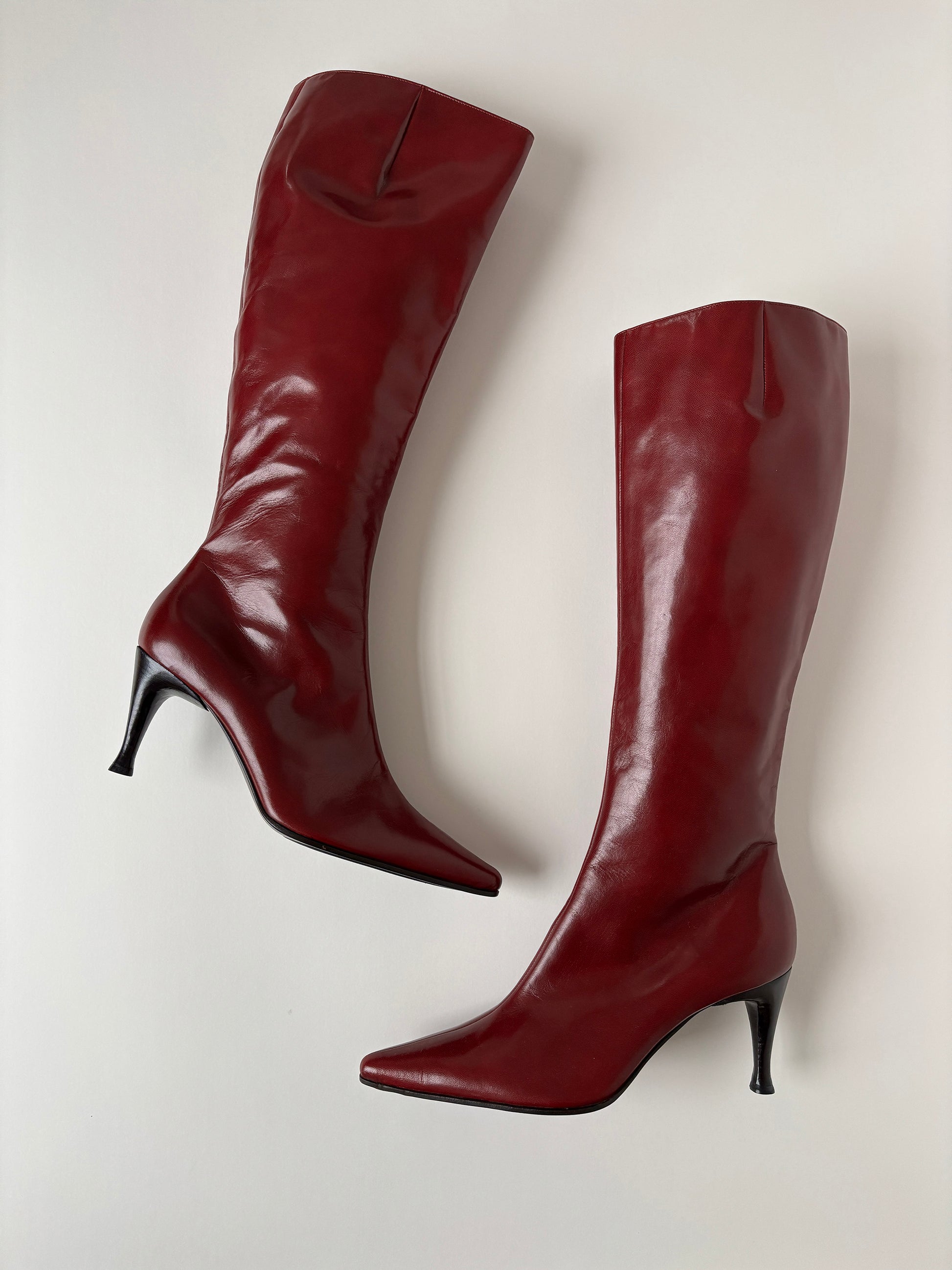 Vintage Sergio Rossi 2000s italian luxuryred boots with midi heel.