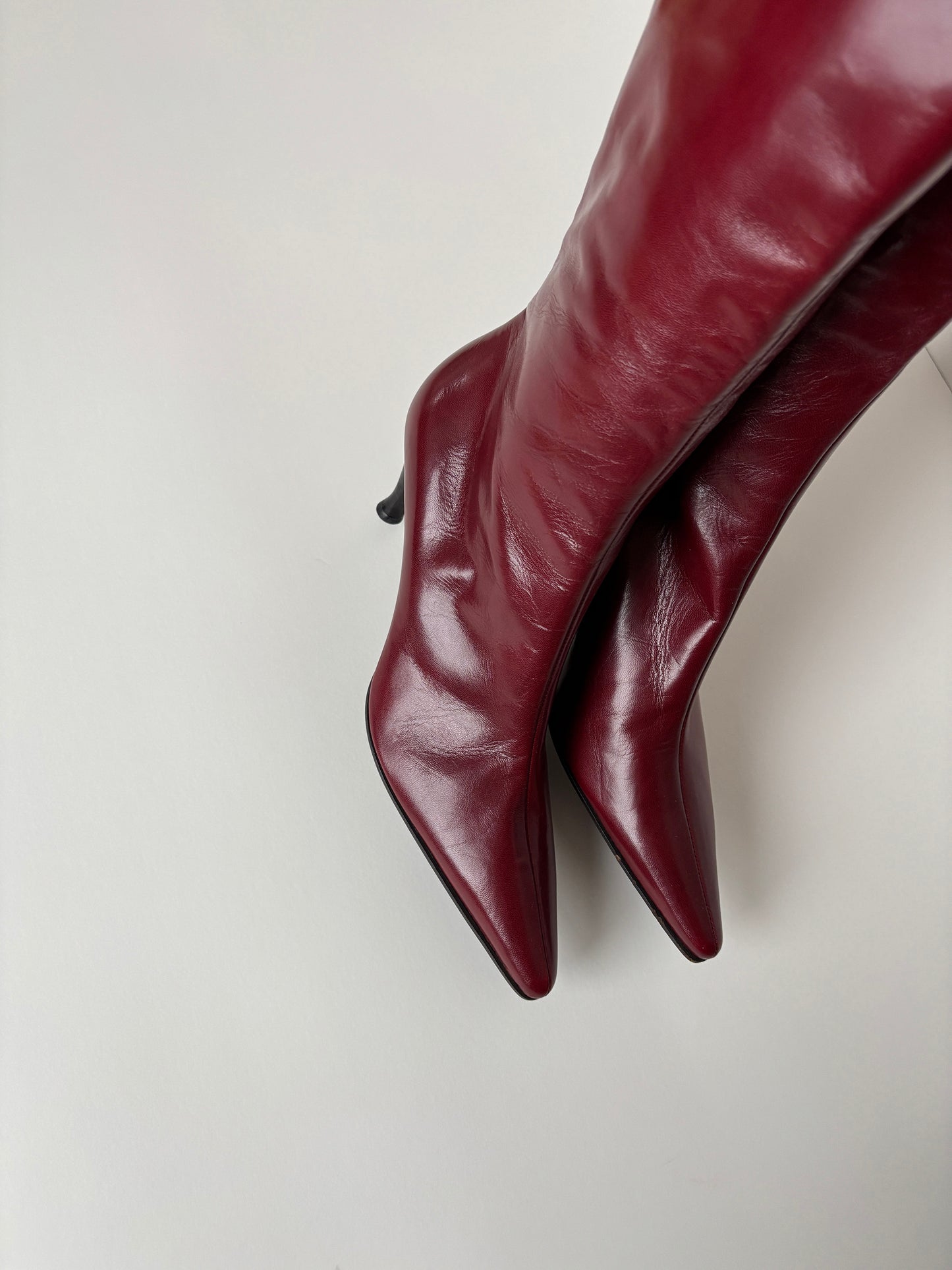 Vintage Sergio Rossi 2000s italian luxuryred boots with midi heel.