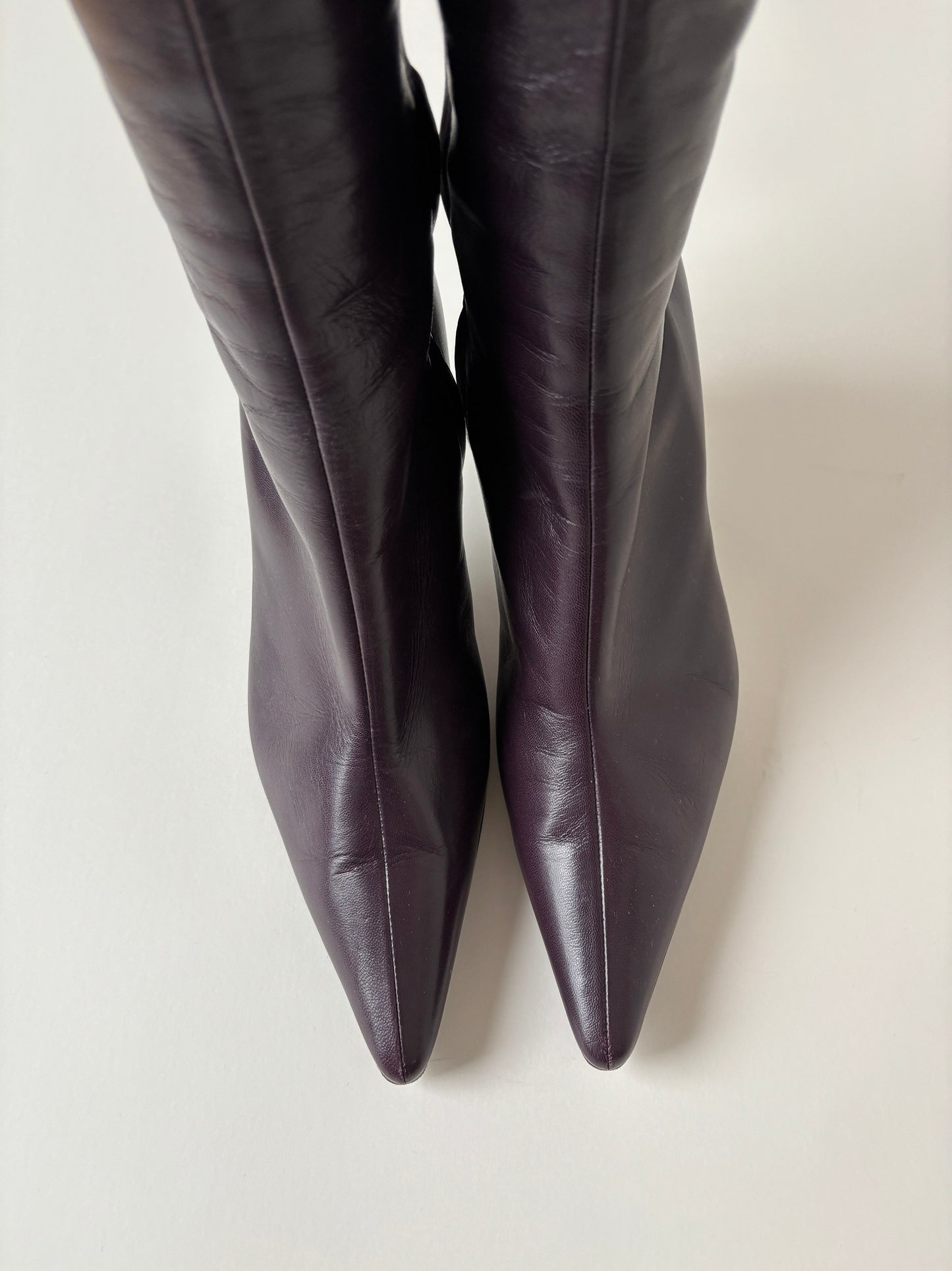 Vintage Sergio Rossi 2000s italian luxuryred boots with midi heel.