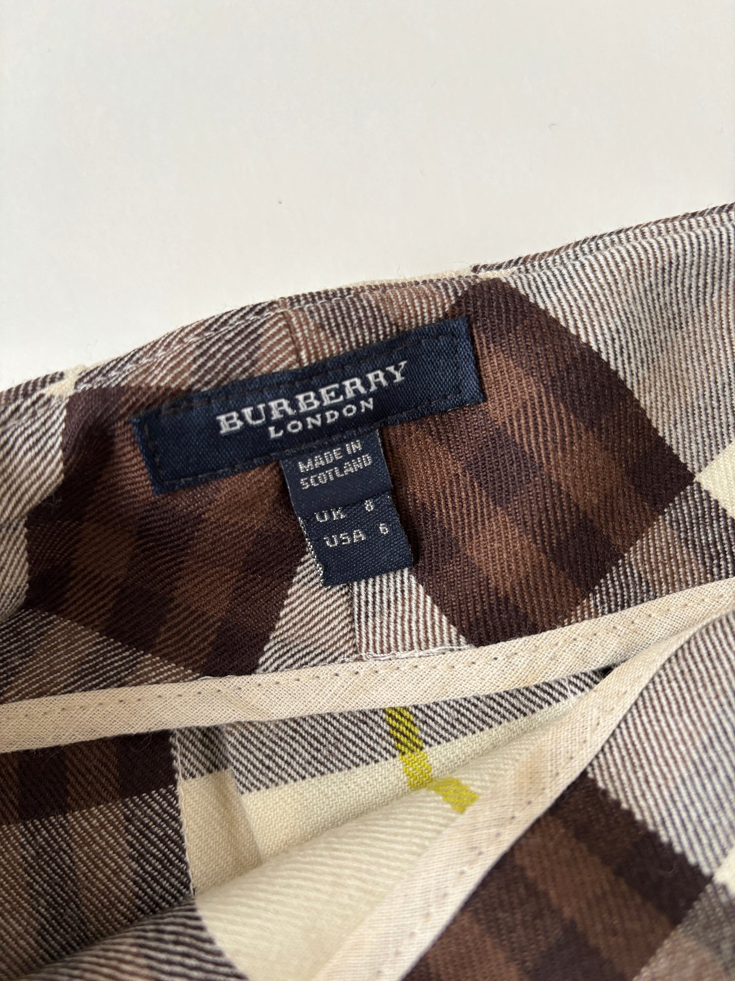 Burberry Brit 2000s beige tartan wool mini skirt with leather straps  XS-S