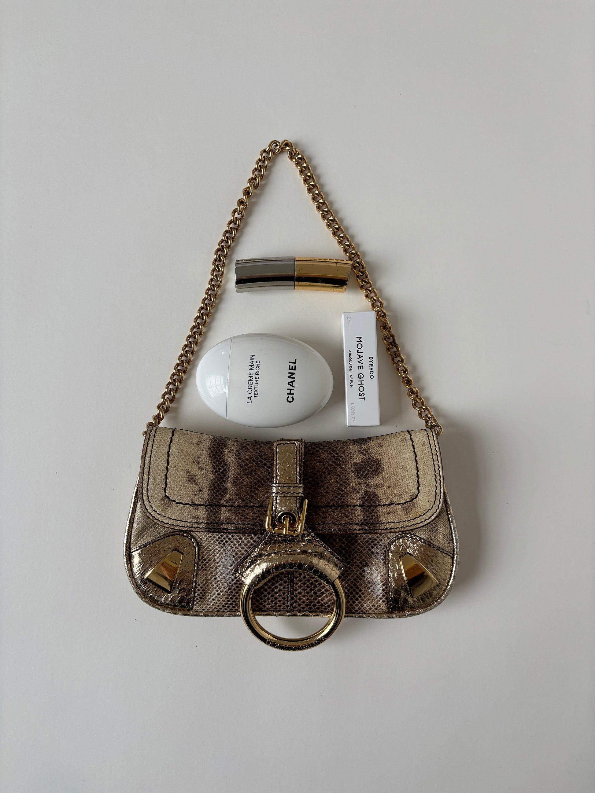 Vintage Dolce & Gabbana 200s rare mini O-Ring baguette bag with golden chain.