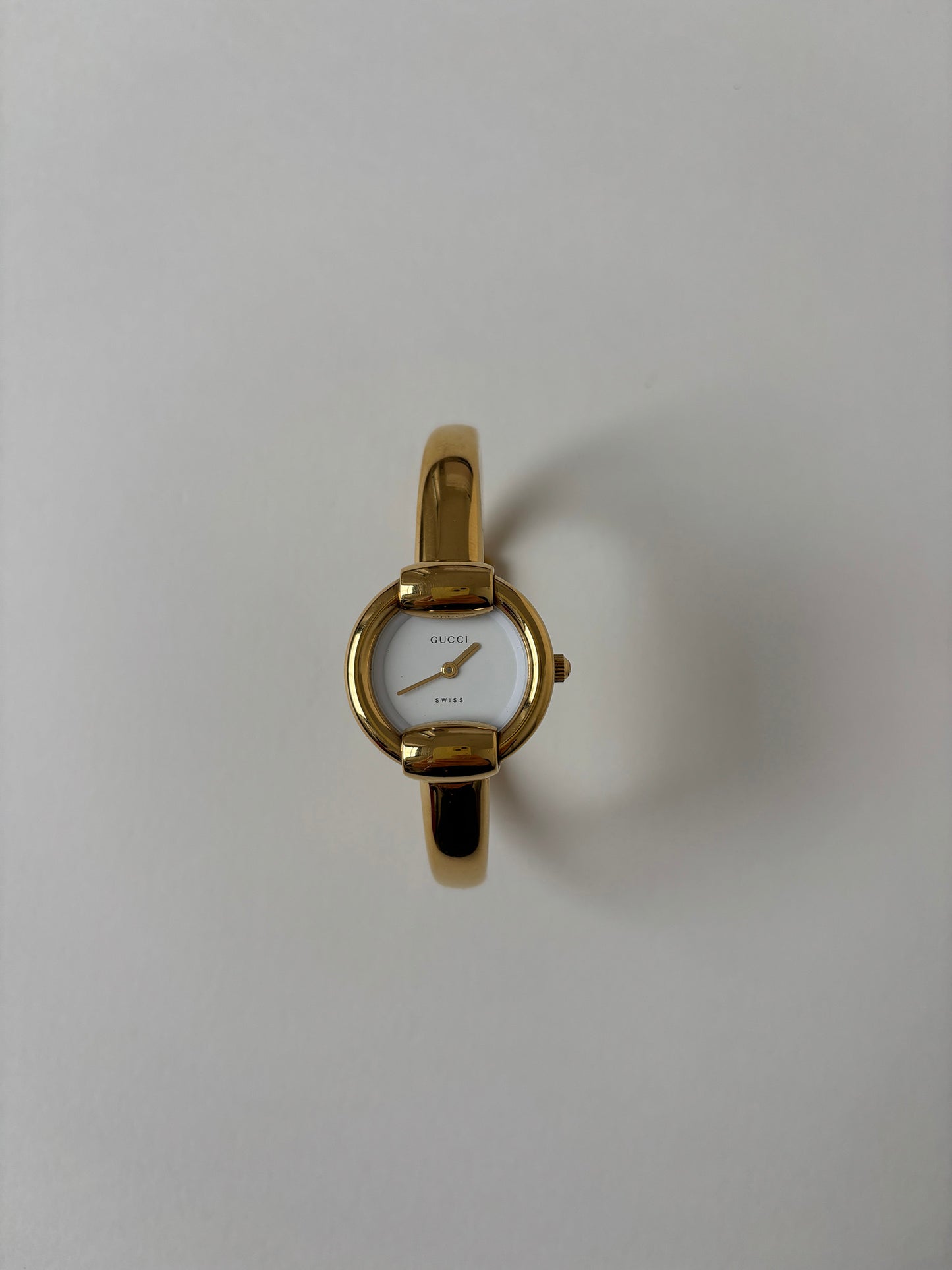 Gucci by Tom Ford 1990s 1400L 18K gold plated bangle watch
