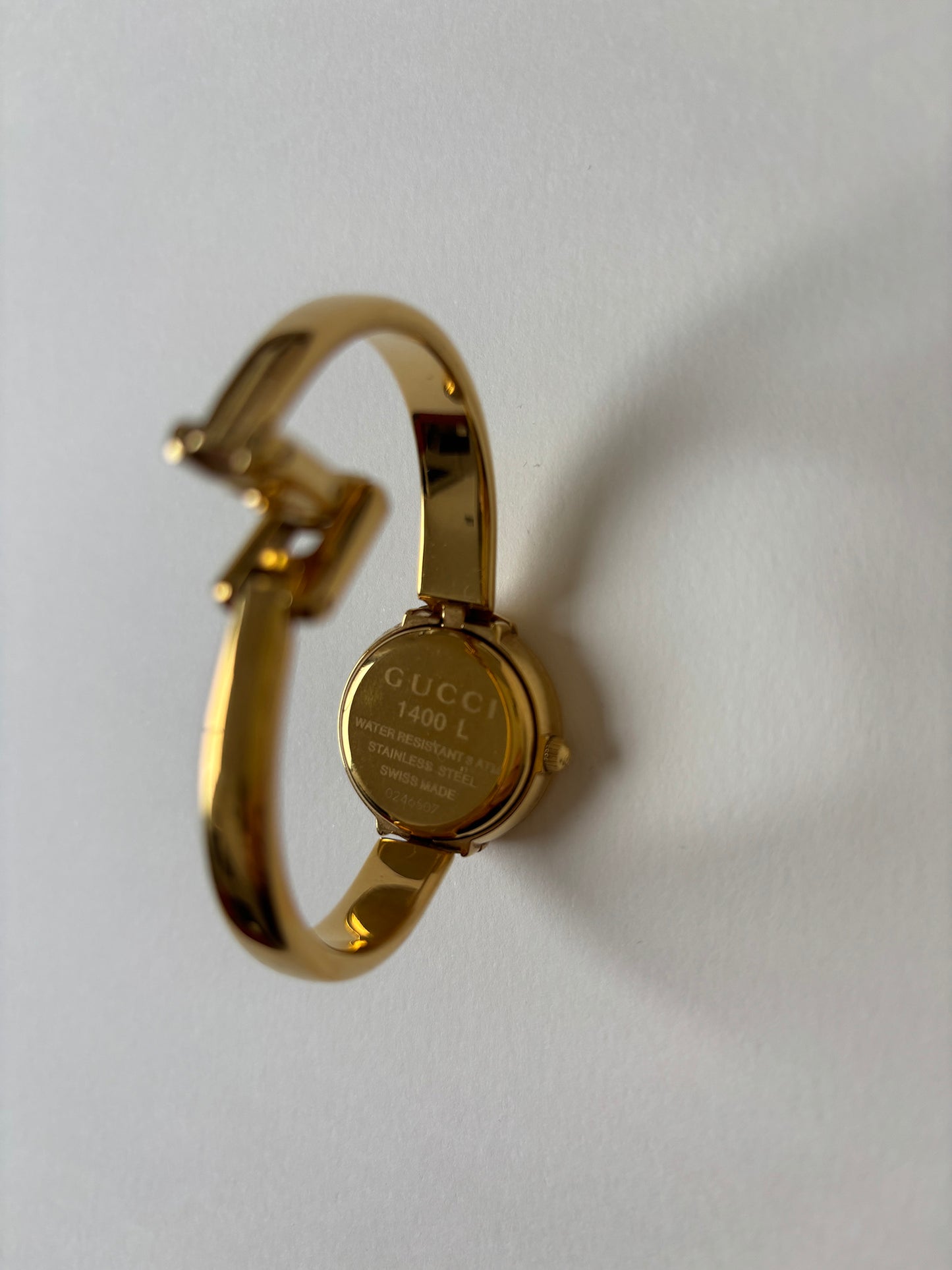 Gucci by Tom Ford 1990s 1400L 18K gold plated bangle watch