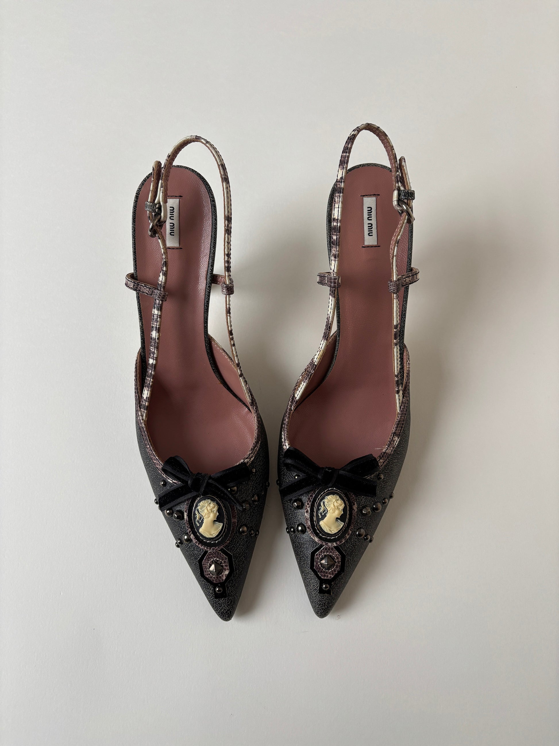 Vintage Miu Miu 2000s sling back kitten heels with shell gem and studs details. Very rare model.