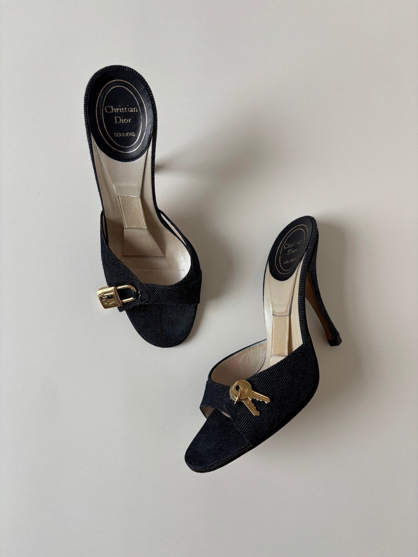 Vintage Christian Dior by John Galliano 2000s iconic denim lock key heels, with cute golden details.