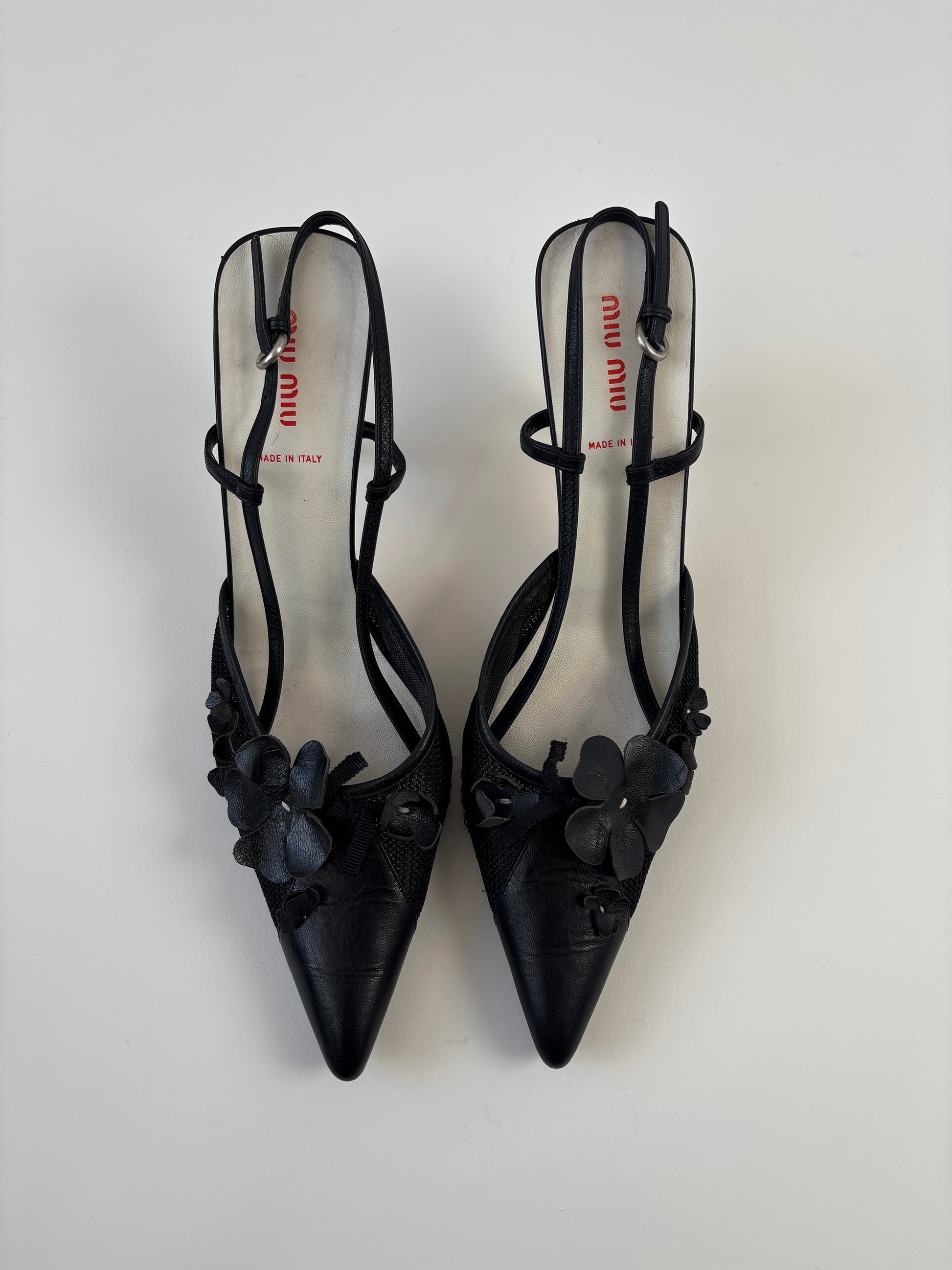 Vintage Miu Miu 2000s black floral mesh slingbacks with cute flower applications and mesh details.