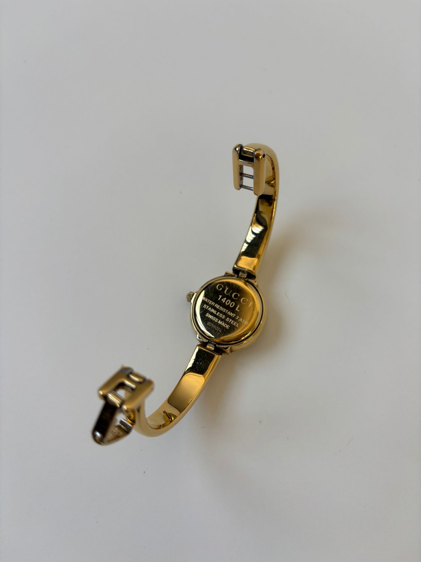 Gucci by Tom Ford 1990s 1400L 18K gold plated bangle watch