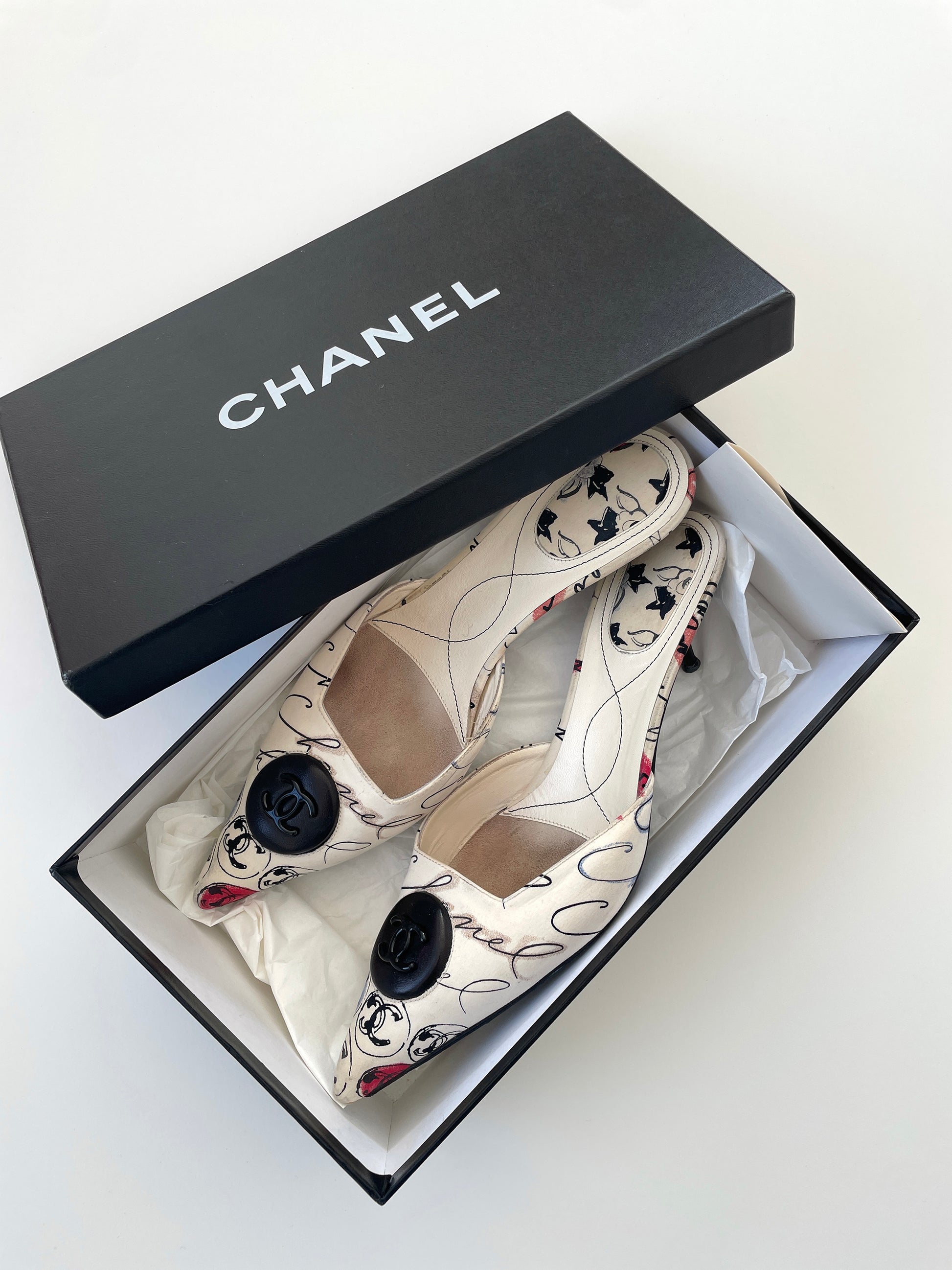 Vintage iconic Chanel 2000 edition cream white cloth mules with illustrations by by Karl Lagerfeld