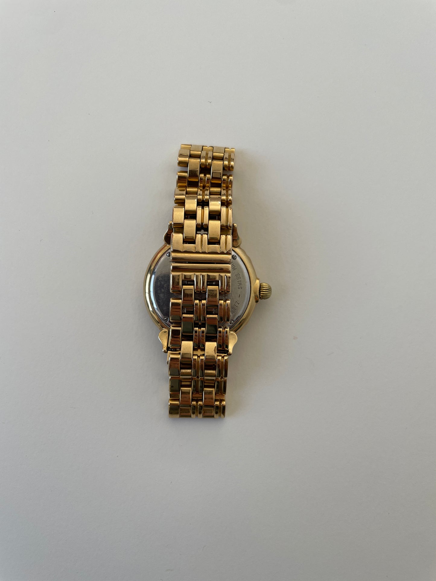 YSL 1990s gold metal watch