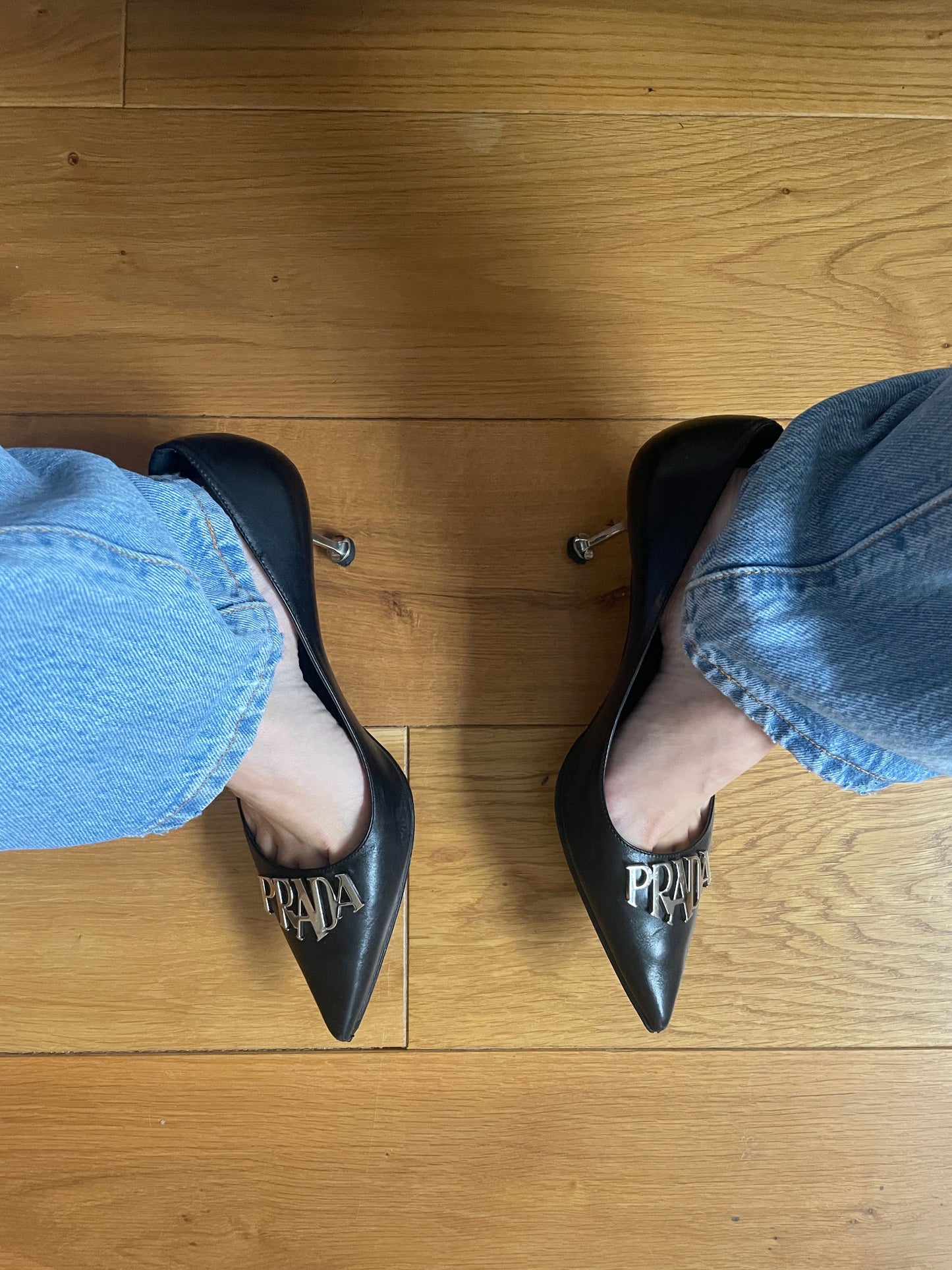 Prada metal logo pointed heels