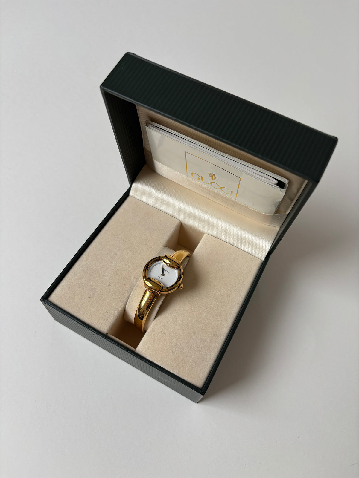 Gucci by Tom Ford 1990s 1400L 18K gold plated bangle watch