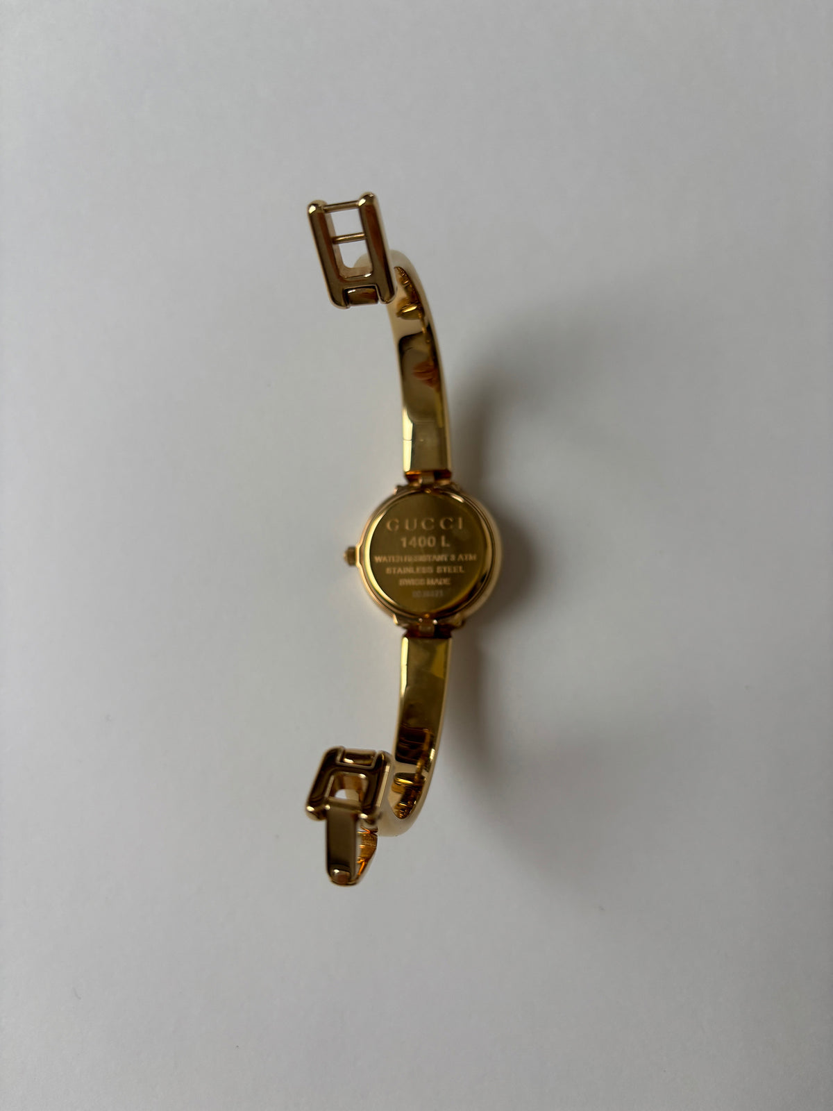 Gucci by Tom Ford 1990s 1400L 18K gold plated bangle watch