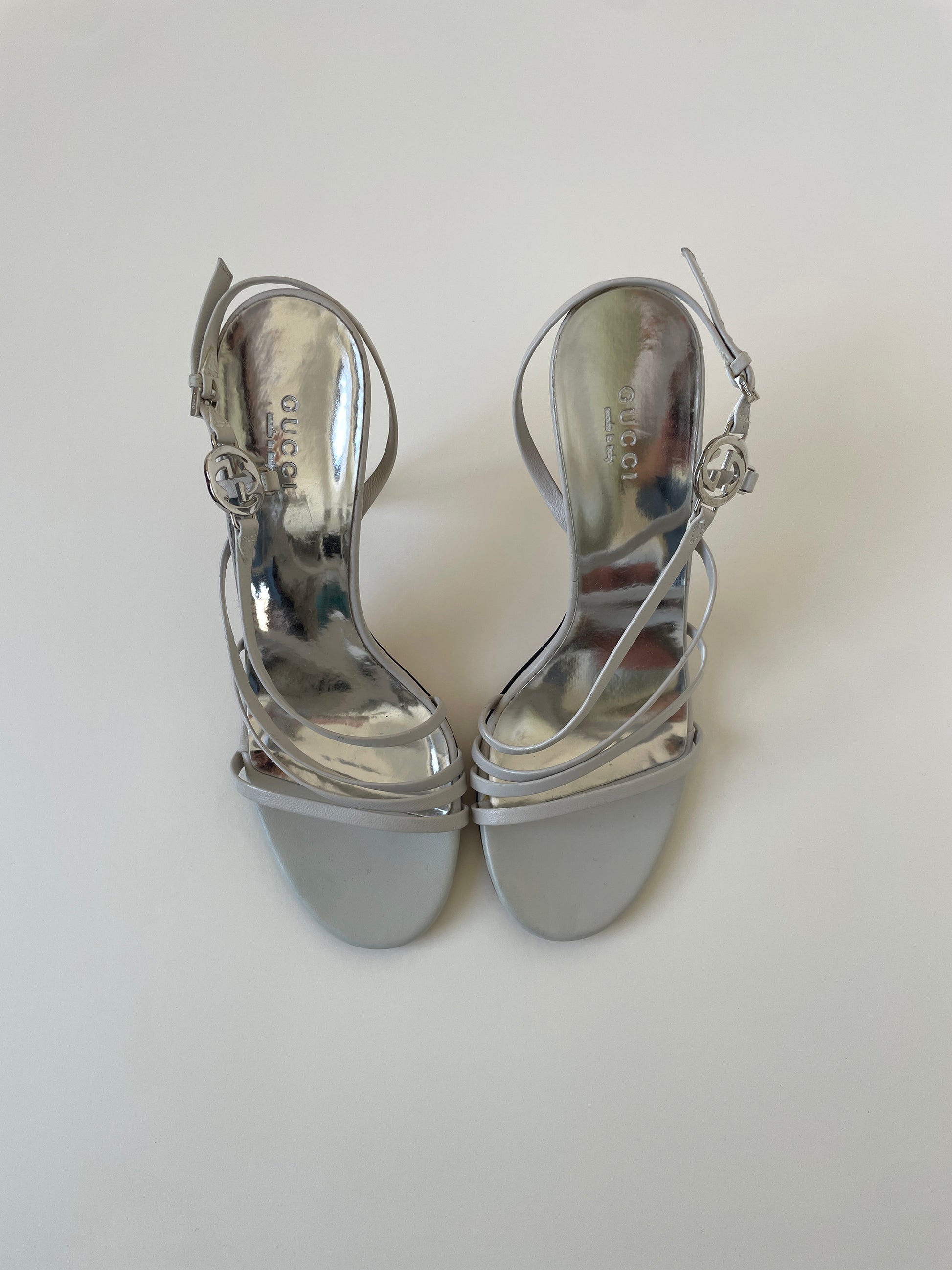 Vintage Gucci 2000s by Tom Ford off-white heels with silver interlocking GG logo details 