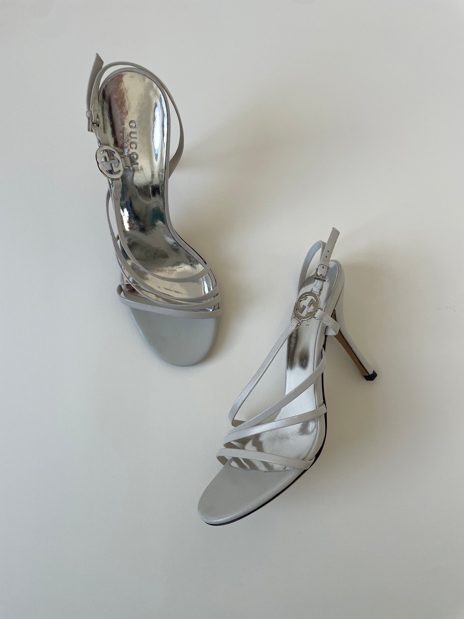 Vintage Gucci 2000s by Tom Ford off-white heels with silver interlocking GG logo details 