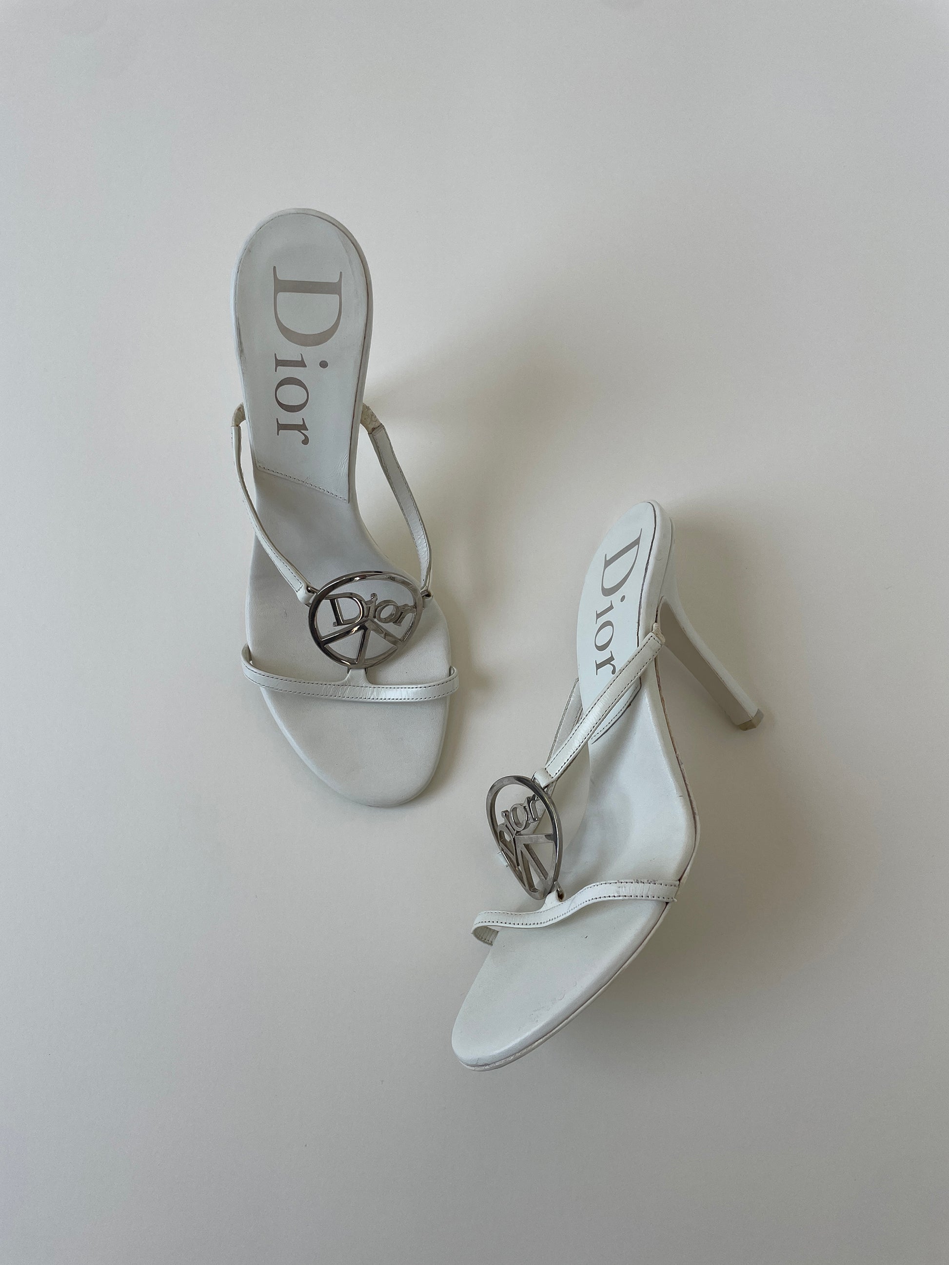 Vintage Christian Dior iconic S/S 2005 by John Galliano white peace heels with silver big peace sign application application