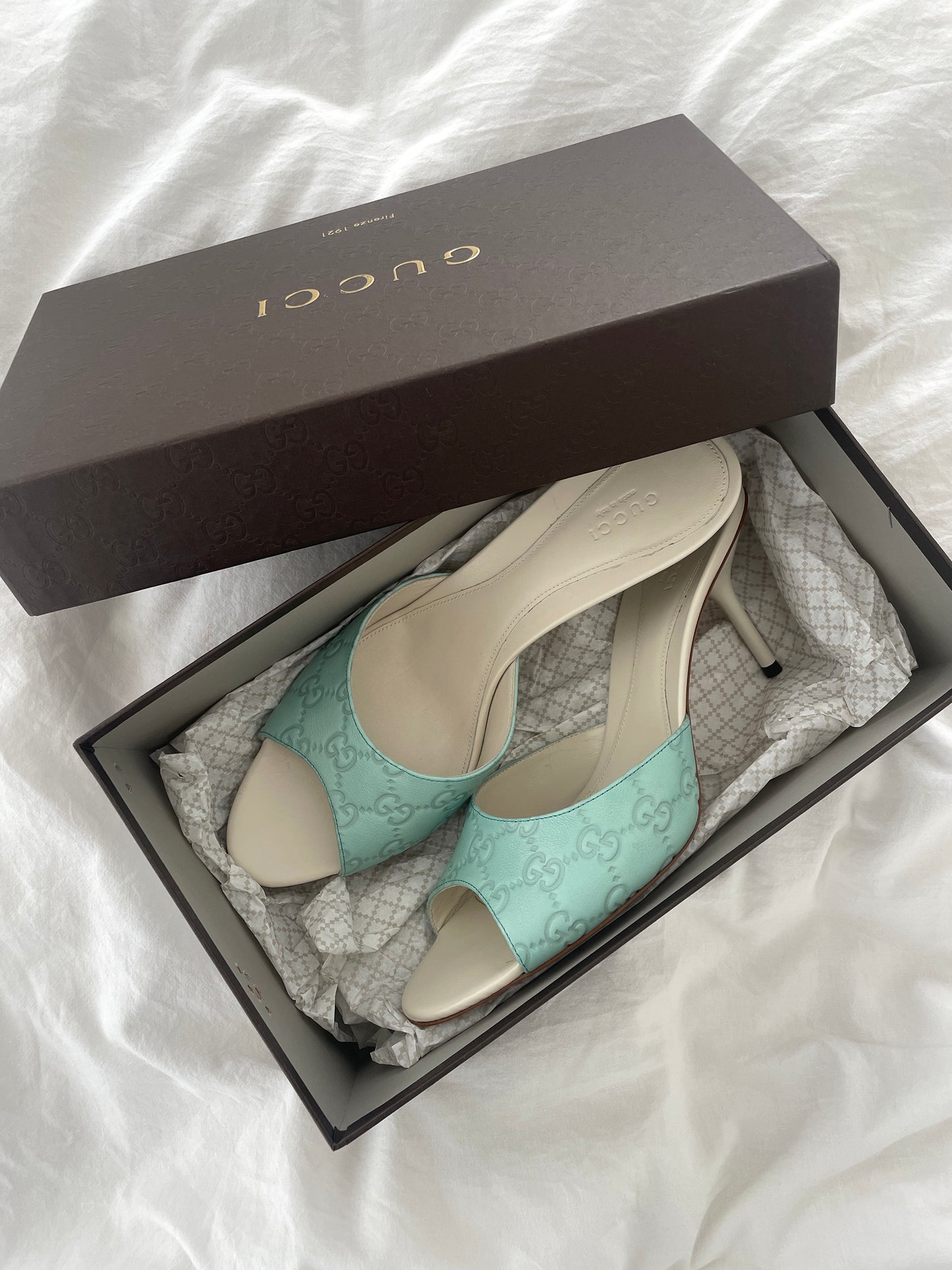 Vintage Gucci 2000s sea blue and cream embossed monogram sandals. Very rare find in UNWORN condition.