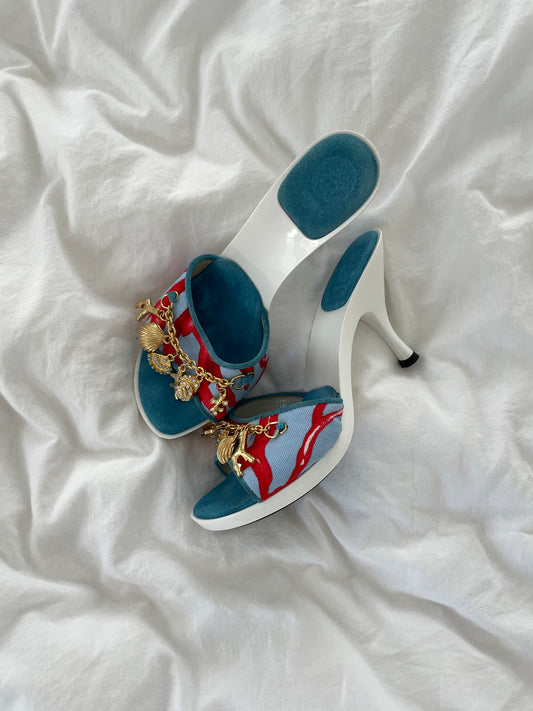 Vintage Gianni Versace 2000s white platform heels with golden sea shells and coral charms.