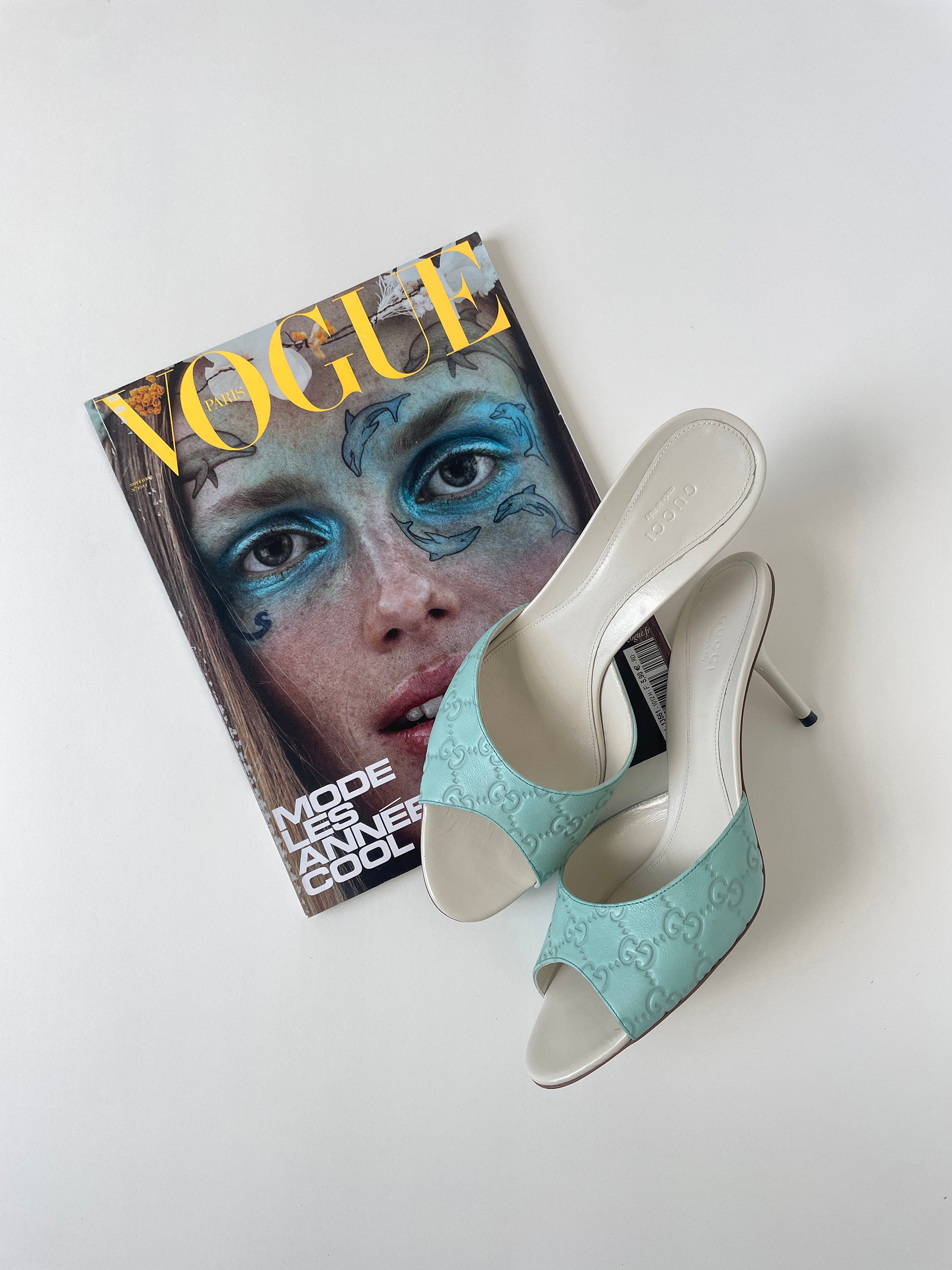 Vintage Gucci 2000s sea blue and cream embossed monogram sandals. Very rare find in UNWORN condition.