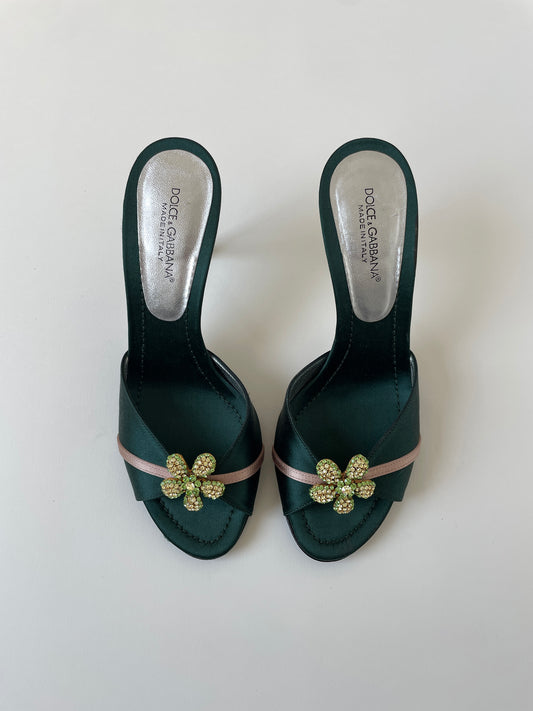 Vintage Dolce &amp; Gabbana 2000s emerald satin heels with green rhinestone flower application.