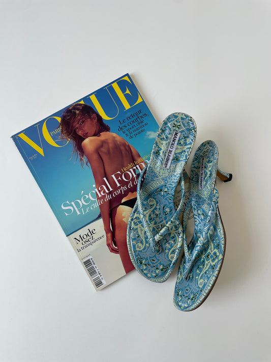 Vintage Manolo Blahnik baby blue metallic paisley thong kitten heels.
