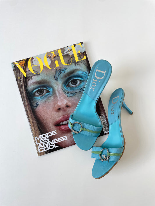 Vintage Christian Dior by John Galliano 2000s off turquoise charm kitten heel with ring detail.
