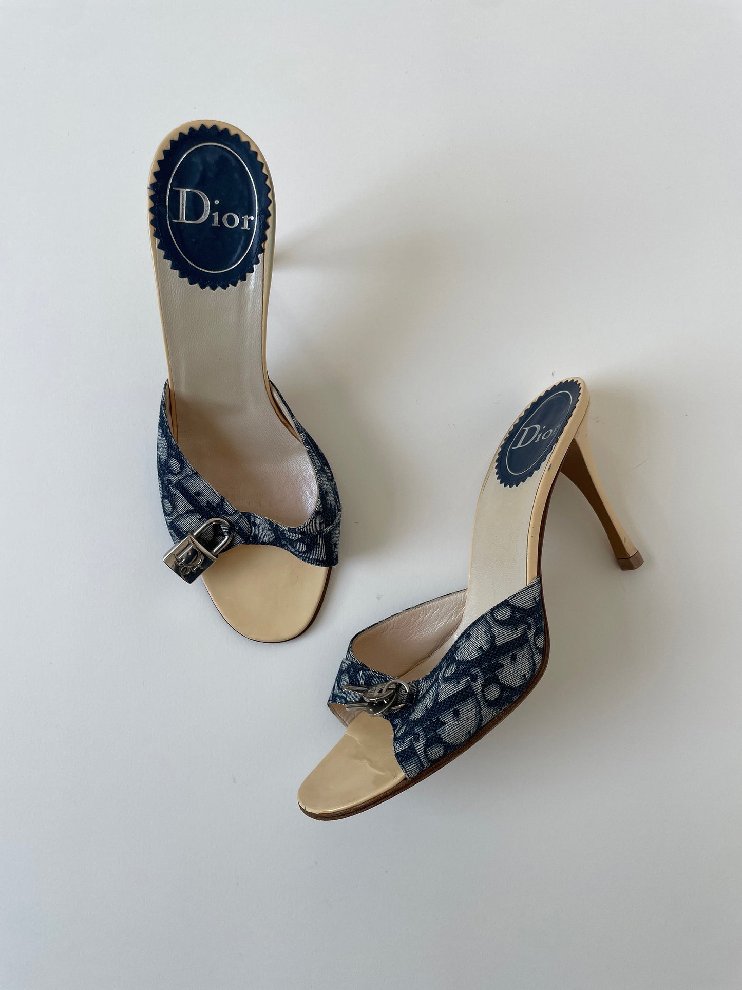 Vintage Christian Dior 2000s iconic denim blue monogram lock key heels with silver padlock details.