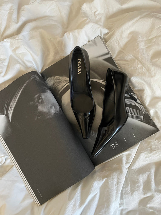 Prada patent leather metal logo heels