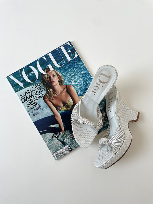 Vintage Christian Dior by John Galliano 2003 white python wedge platform heels with silver D-charms.
