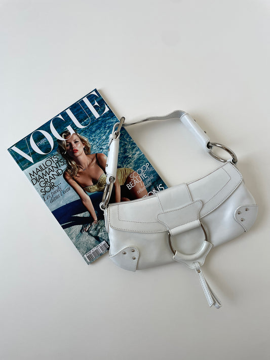 Vintage Dolce &amp; Gabbana 2000s white baguette bag. Iconic cheetah print lining and silver hardware D-ring