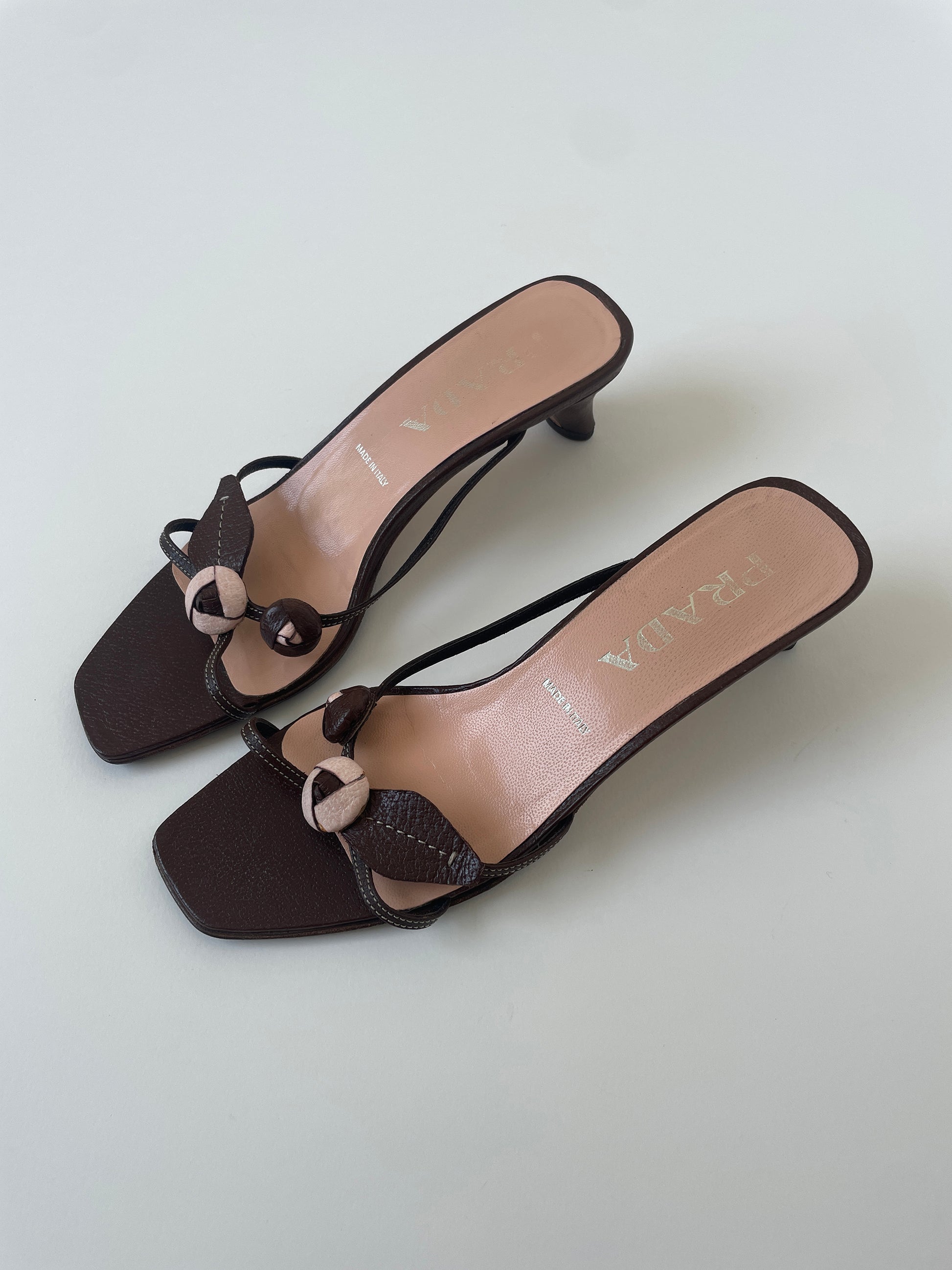 Vintage Prada 1990s brown rosebud kitten heel sandals with cute applications.
