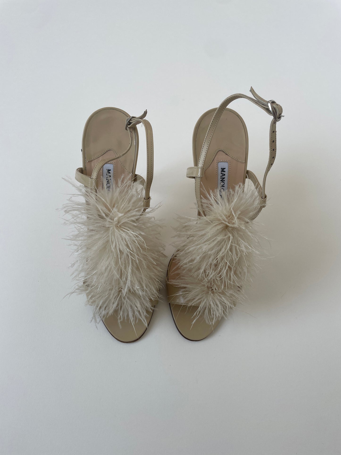 Vintage Manolo Blahnik 2000s beige Marabu feather sandal heels with tiny flare at the heel. 