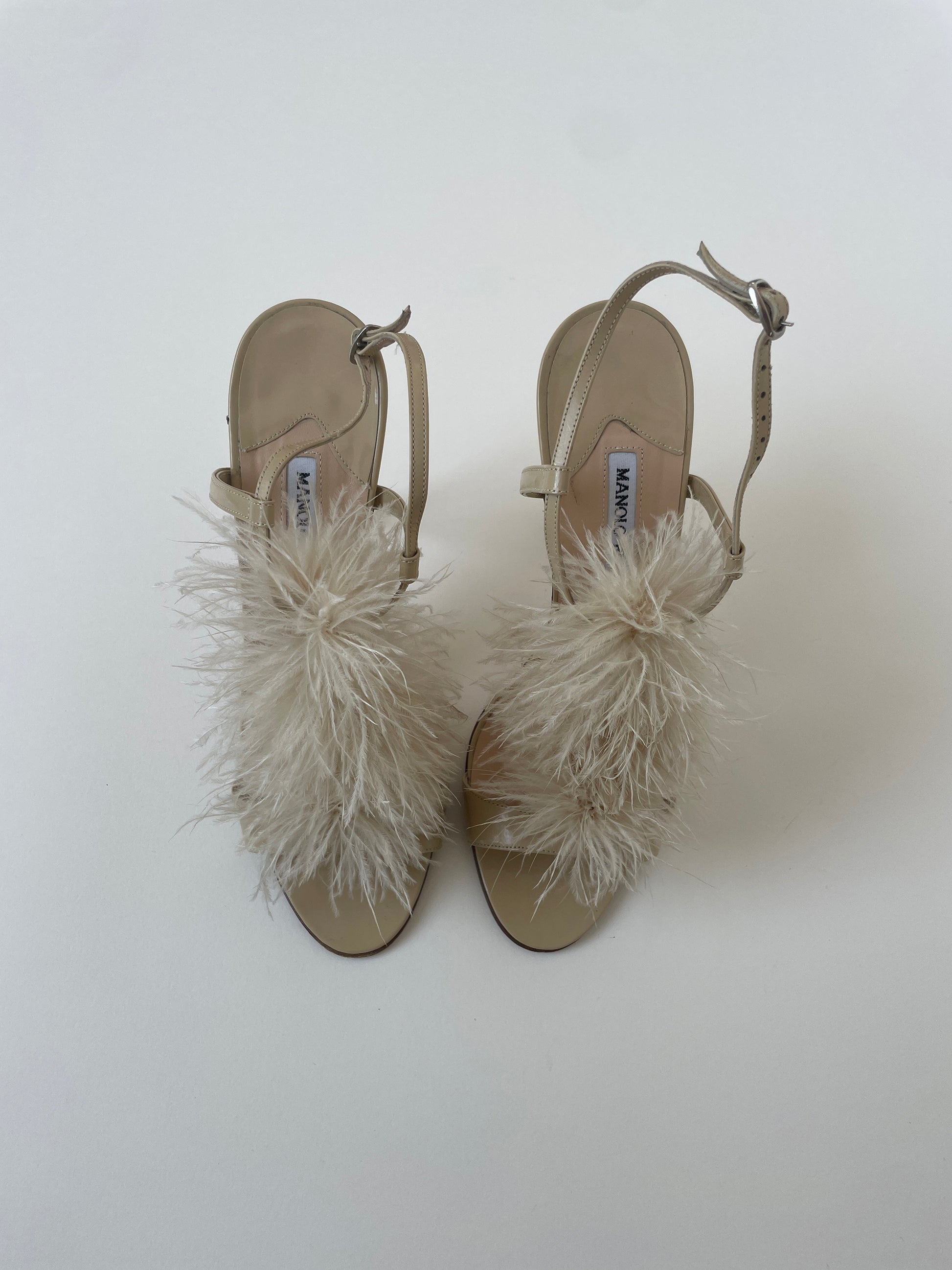 Vintage Manolo Blahnik 2000s beige Marabu feather sandal heels with tiny flare at the heel. 
