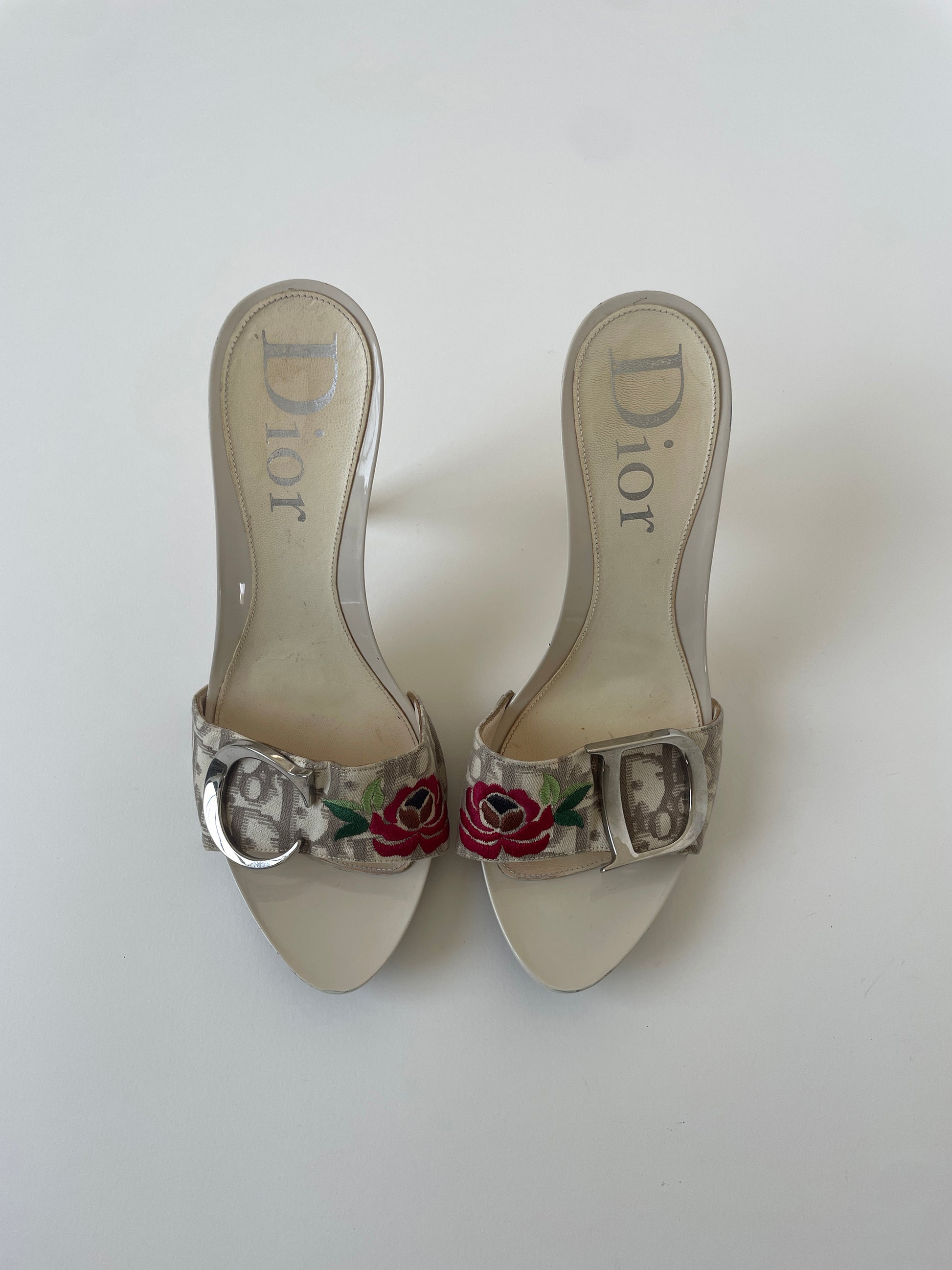 Vintage Christian Dior by John Galliano iconic cream white plateau monogram heels with silver CD logo detail and floral embroidery.