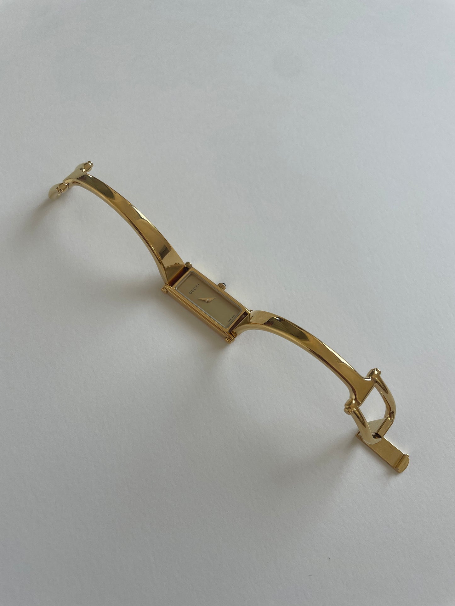 Gucci by Tom Ford 2000s 1500L 18K gold plated bangle watch