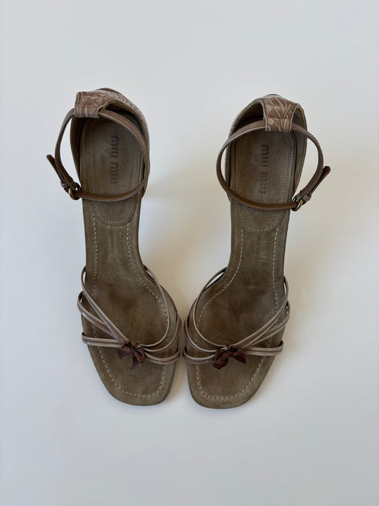 Vintage Miu Miu beige suede dainty bow kitten heels with embossed western details at the heels