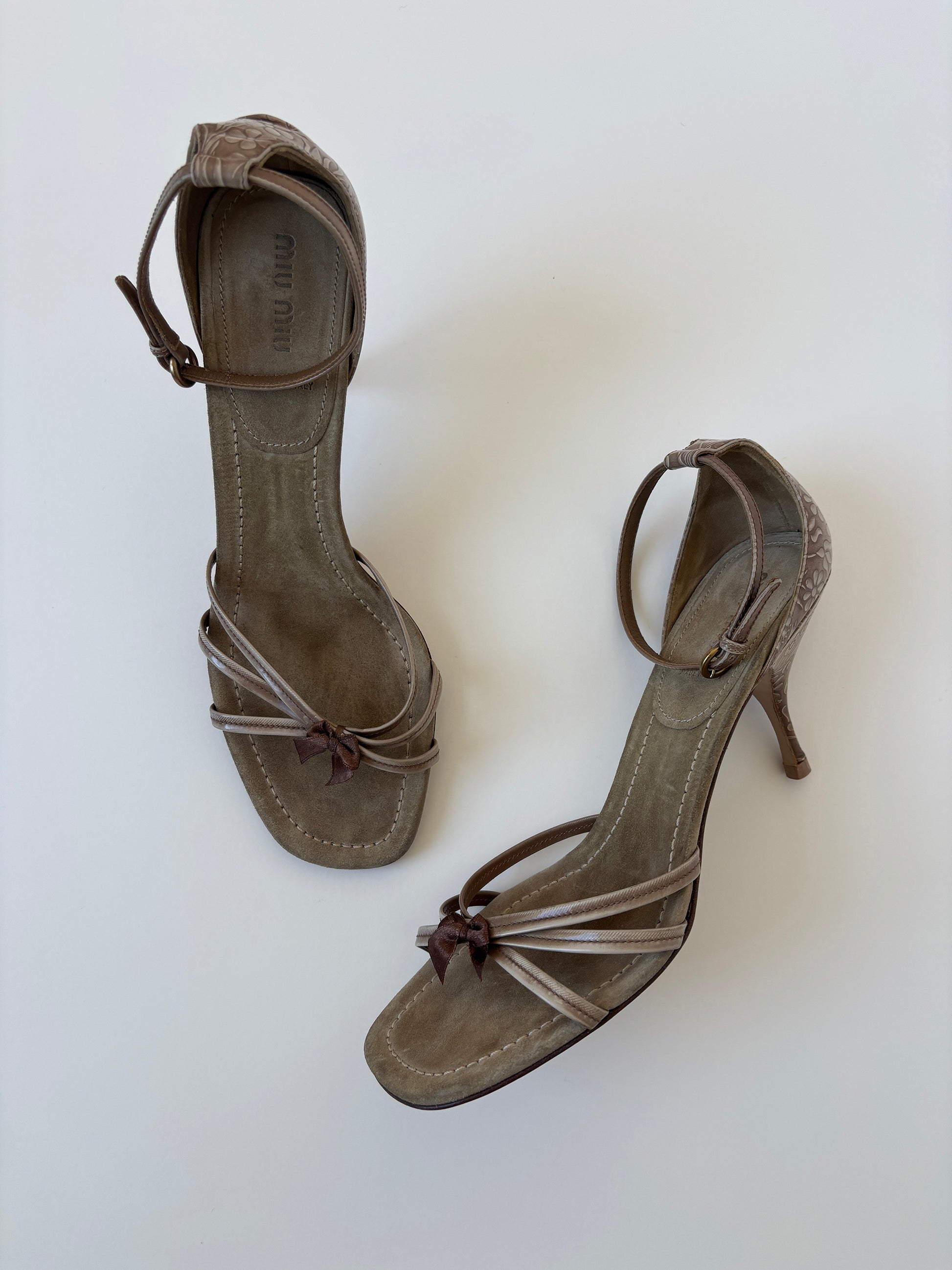 Vintage Miu Miu beige suede dainty bow kitten heels with embossed western details at the heels