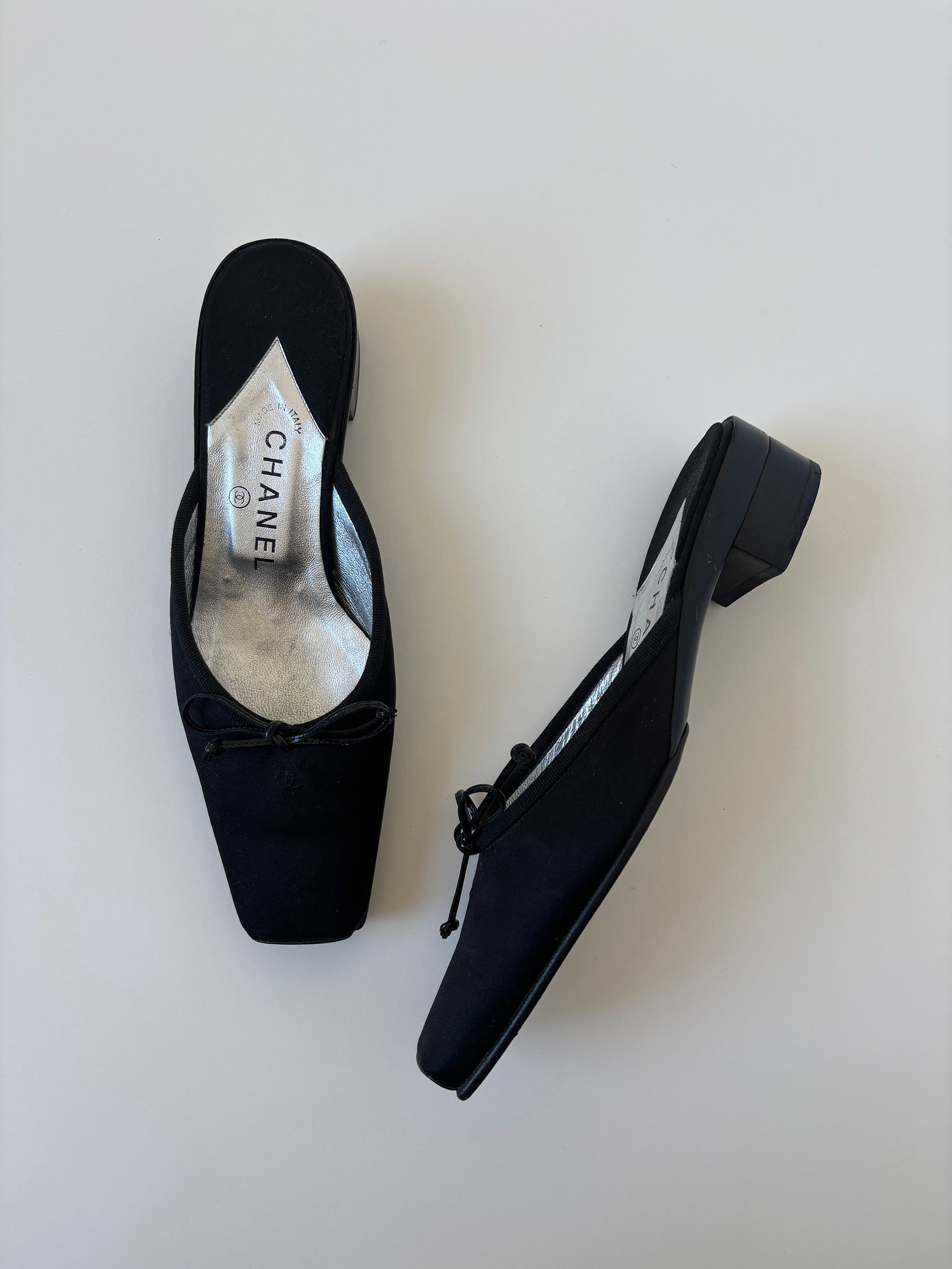 Vintage Chanel 1990s by Karl Lagerfeld CC black squared black ballet satin mules with bow and dainty CC logo detail