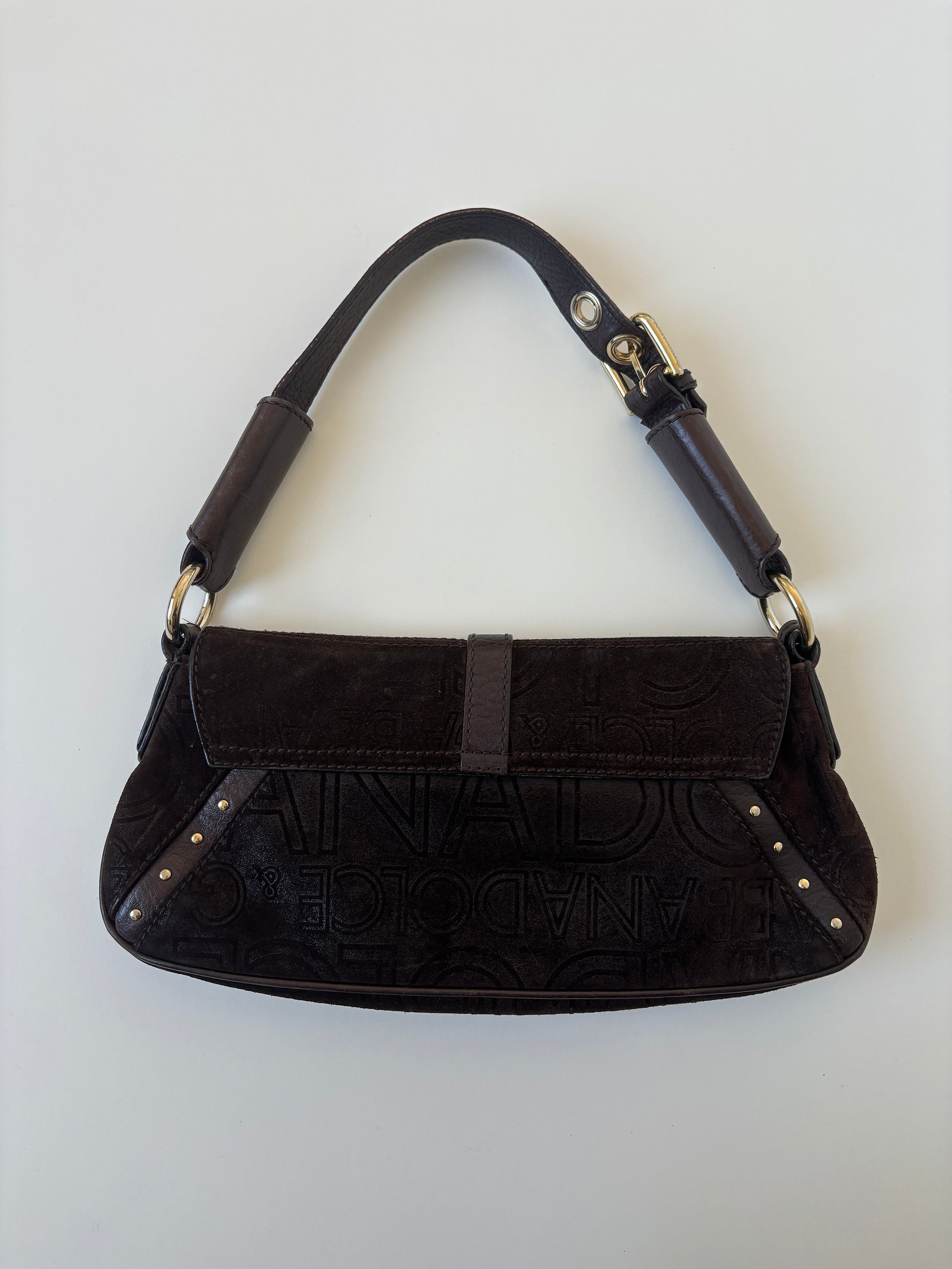 Vintage Dolce &amp; Gabbana O-Ring baguette bag with dark brown suede and logo monogram.